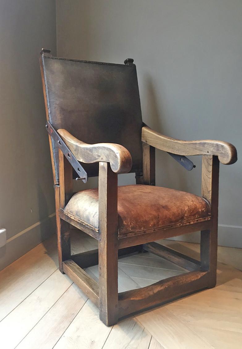 This type of French reclining armchair is also called 'Fauteuil' a Crémallaire, de malade or Molière chair. Crémaillère stands for the iron brackets which make reclining possible, de malade or Molière because they were made to take a NAP without