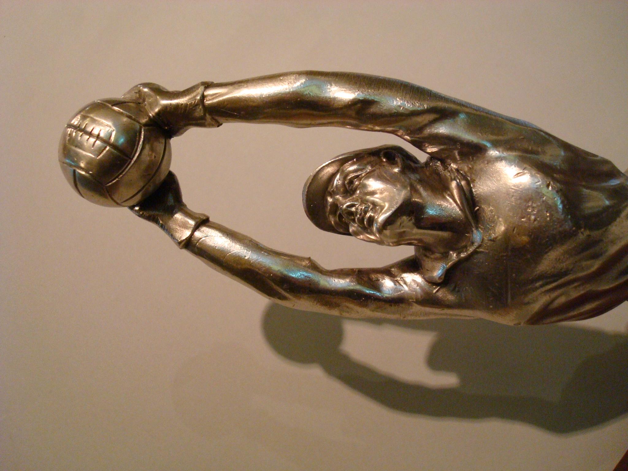 A silvered  figure of a diving football, soccer goalkeeper France, circa 1940, signed E. Drouot. Silvered metal set over a marble base.
Perfect for a trophy.

 