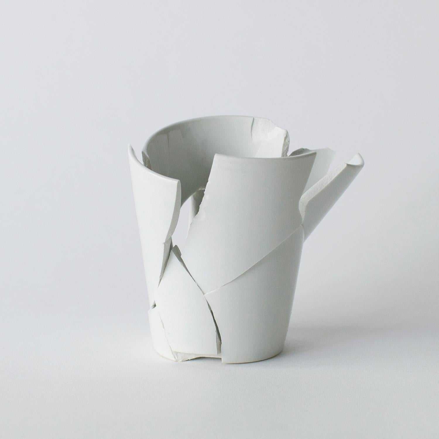 This series is made up of some glass and some ceramic works. These works are highly unique form and looking. Norihiko Terayama created them from damaged vases, coffee cups and so on. He start breaking damaged object into some fragments. Some of