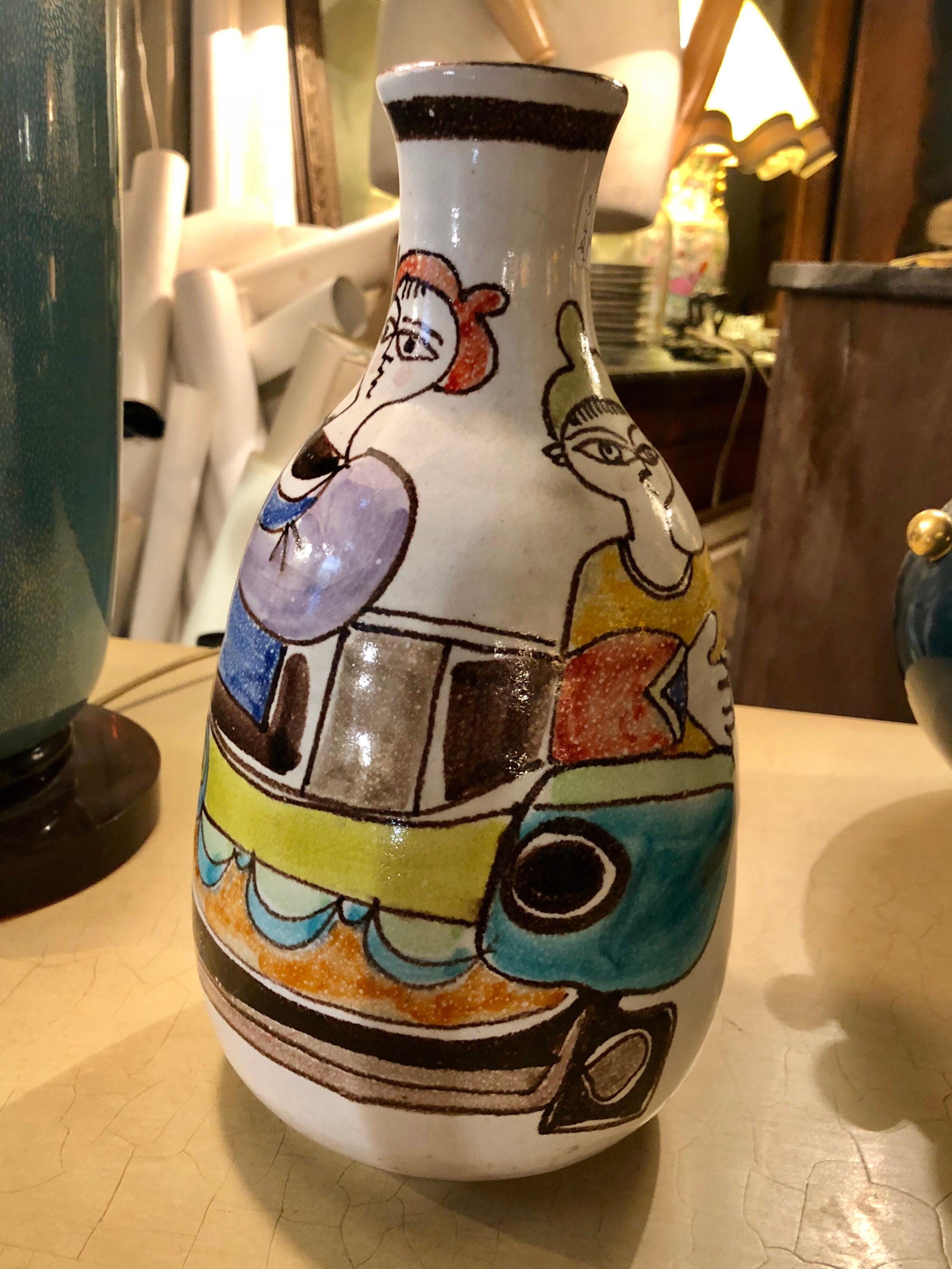 Ceramic vase designed by Giovanni De Simone. Manufactured by himself, circa 1960. Handmade with characteristic drawing and glaze in excellent condition. Signed with artists signature.

Complimentary shipping worldwide!

The brand, Ceramiche De