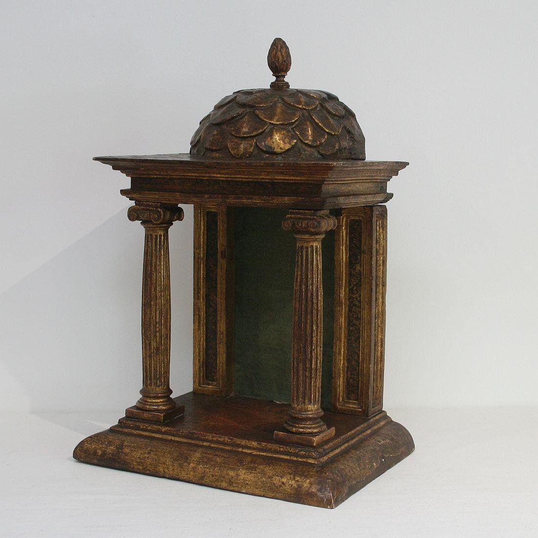 Beautiful small baroque altar shrine with traces of its original gilding and color, Spain, circa 1750. Weathered, small losses and old repairs.









 