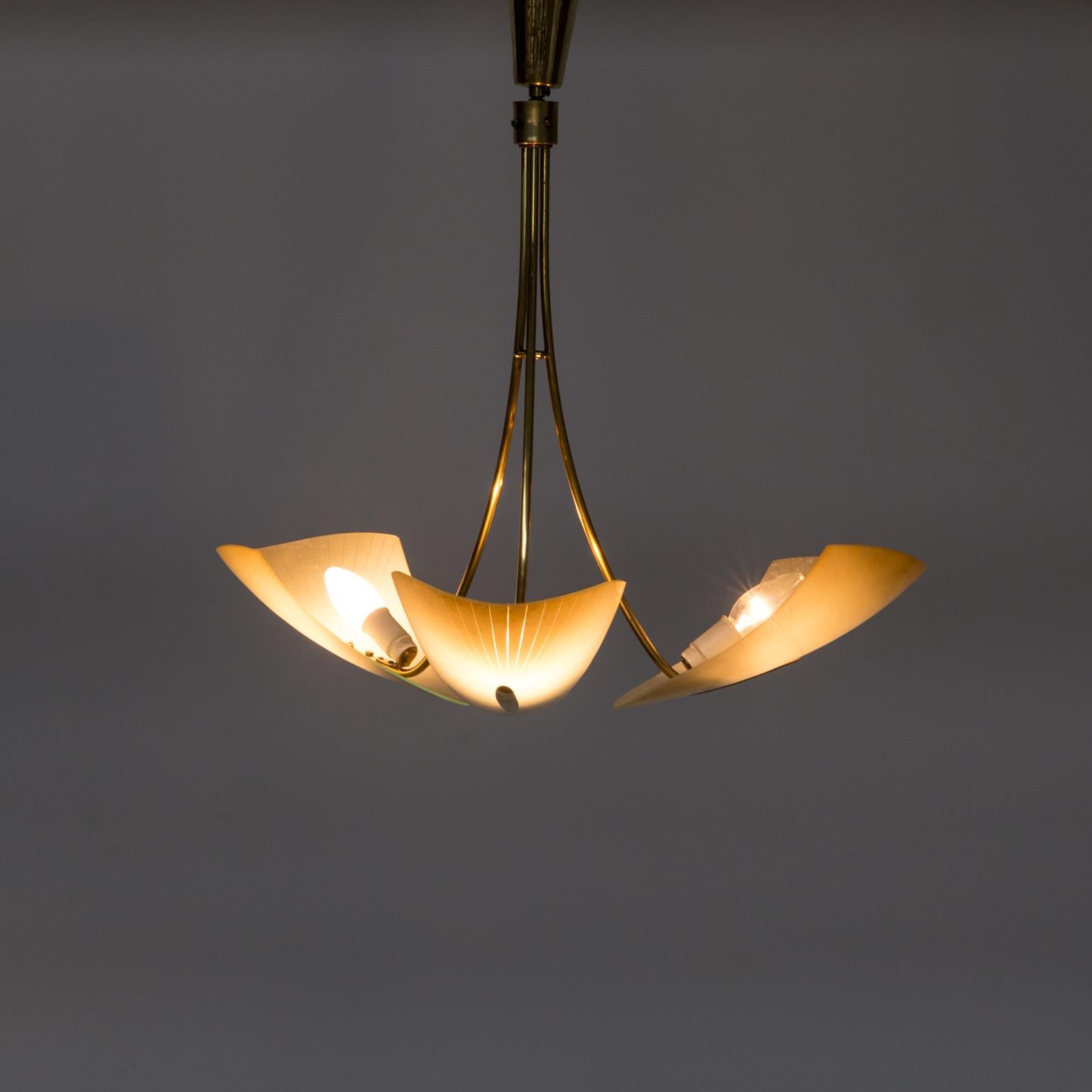 1960s brass and glass pendant hanging lamp. Good and working condition, consistent with age and use.