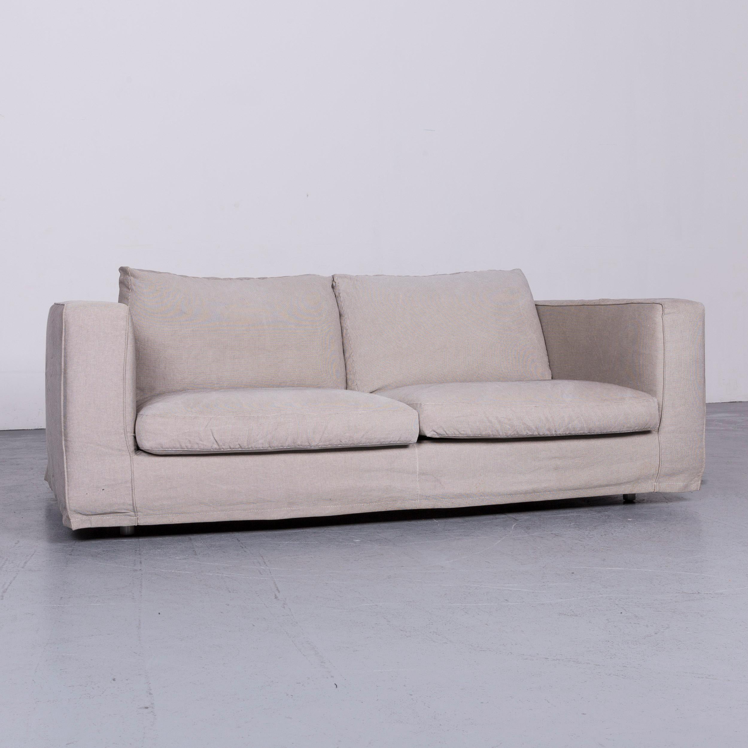 We bring to you an B&B Italia Basiko fabric sofa grey two-seat couch.