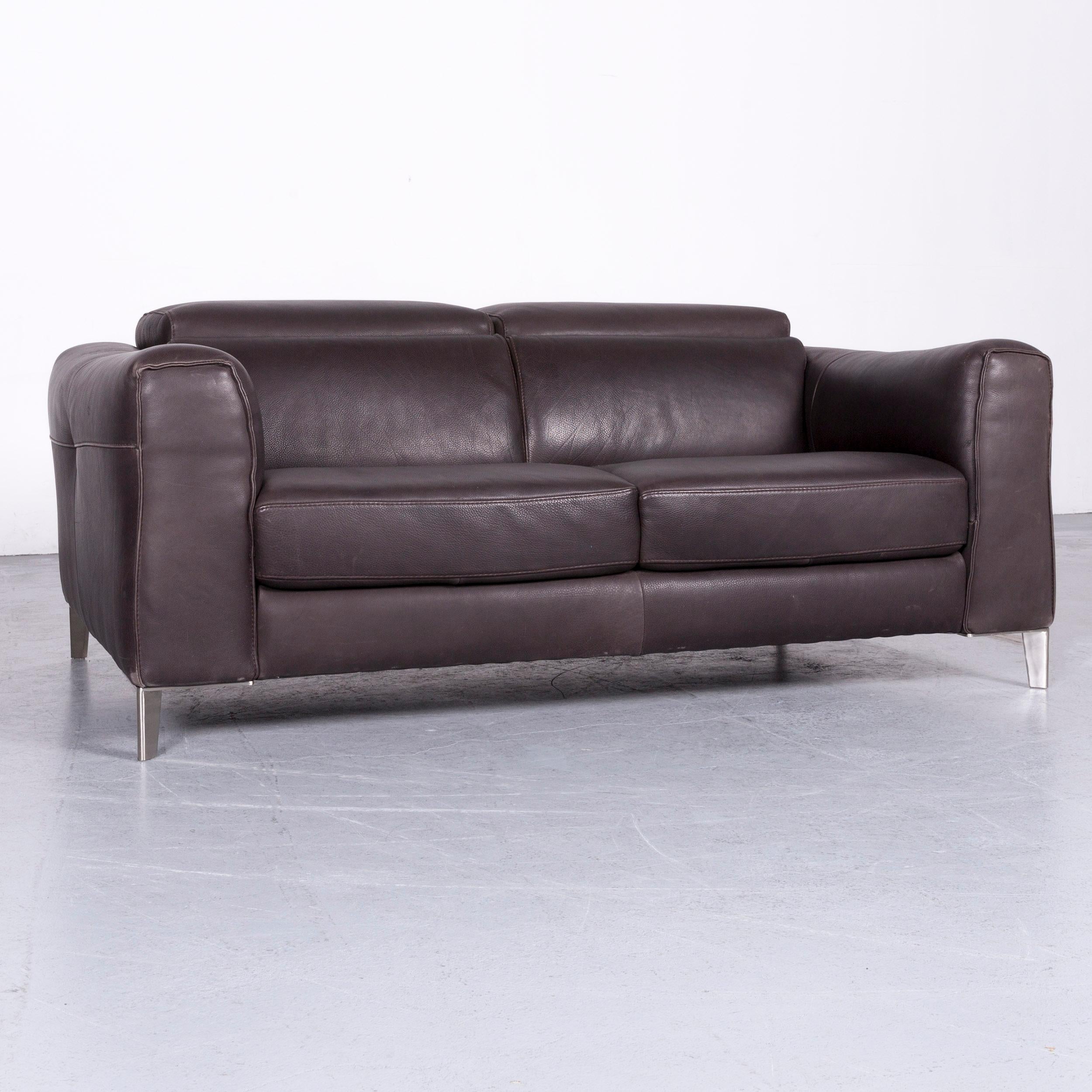 We bring to you a Natuzzi designer leather sofa two-seat couch brown.