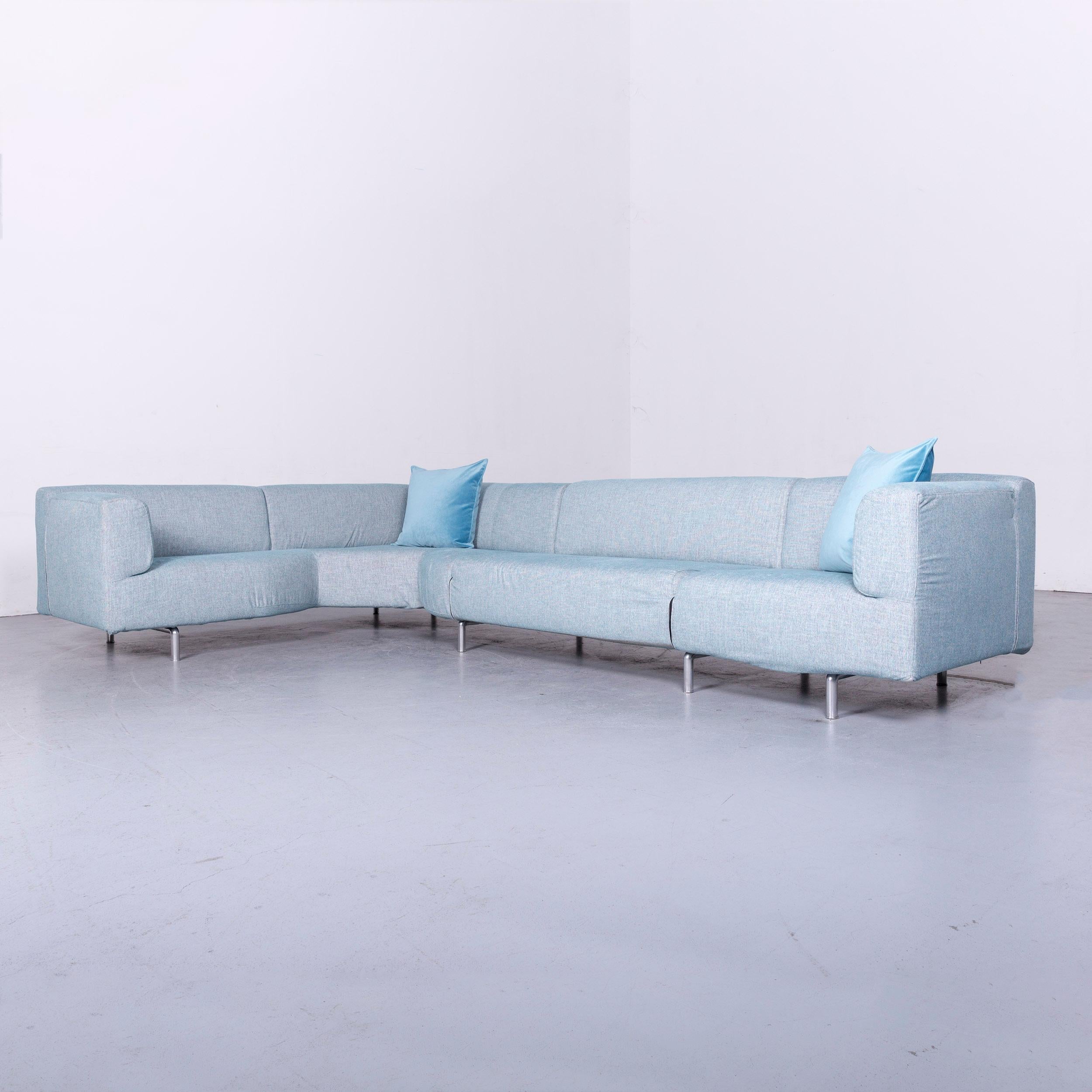 We bring to you a Cassina met designer corner sofa couch blue fabric.