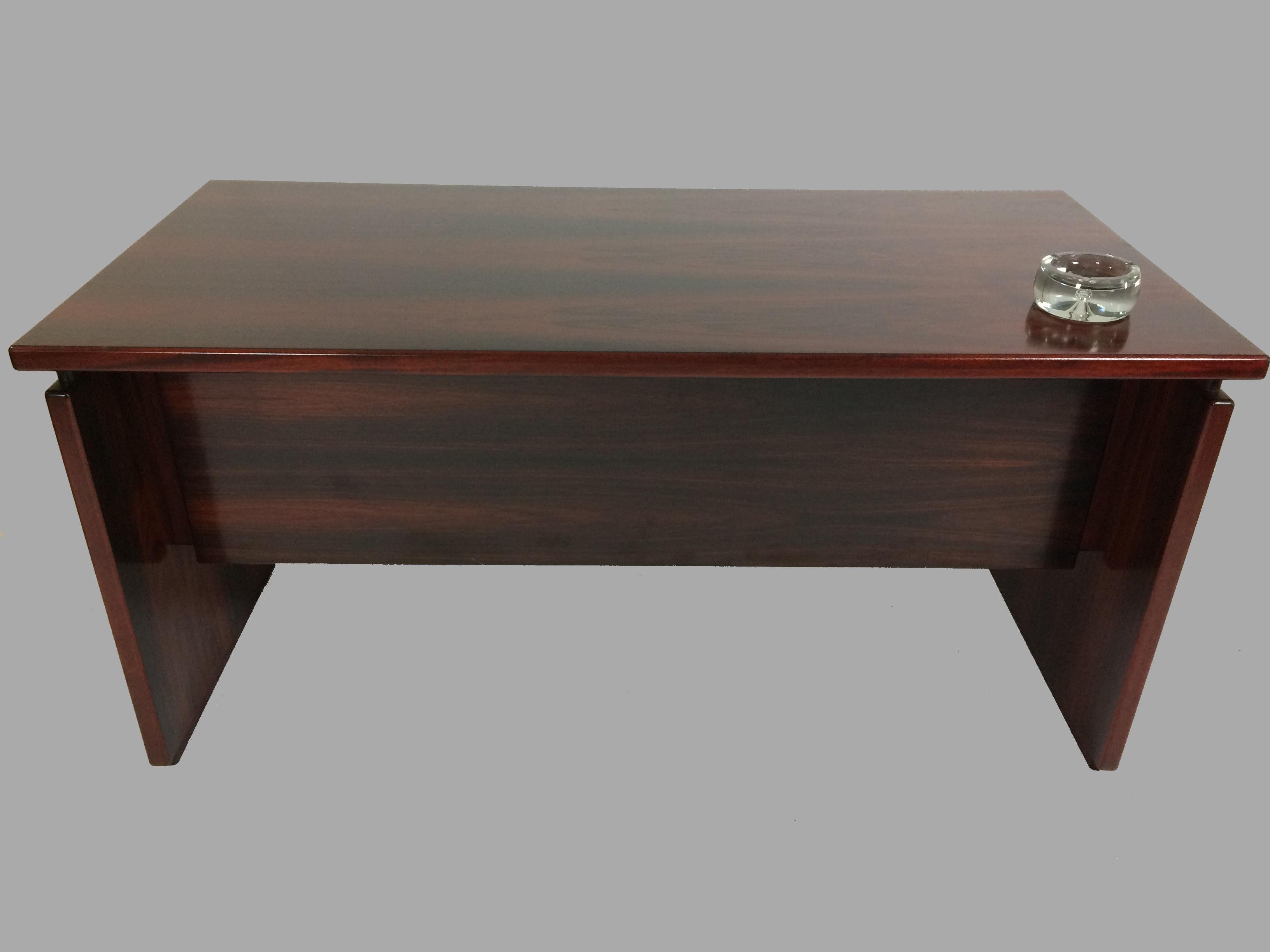 Executive desk from the 1980s designed by Bent Silberg and made by Bent Silberg Mobler.

Only very few desks of this model were produced in rosewood and this desk has been keept stored in it´s original box since it was produced . The desk is
