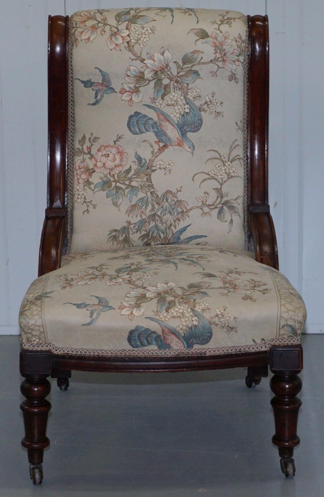 We are delighted to offer for sale this lovely Victorian library, reading or nursing chair with a mahogany frame and satin cotton floral and bird detailed upholstery, part of a four piece suite

As mentioned this is part of a suite, I have this