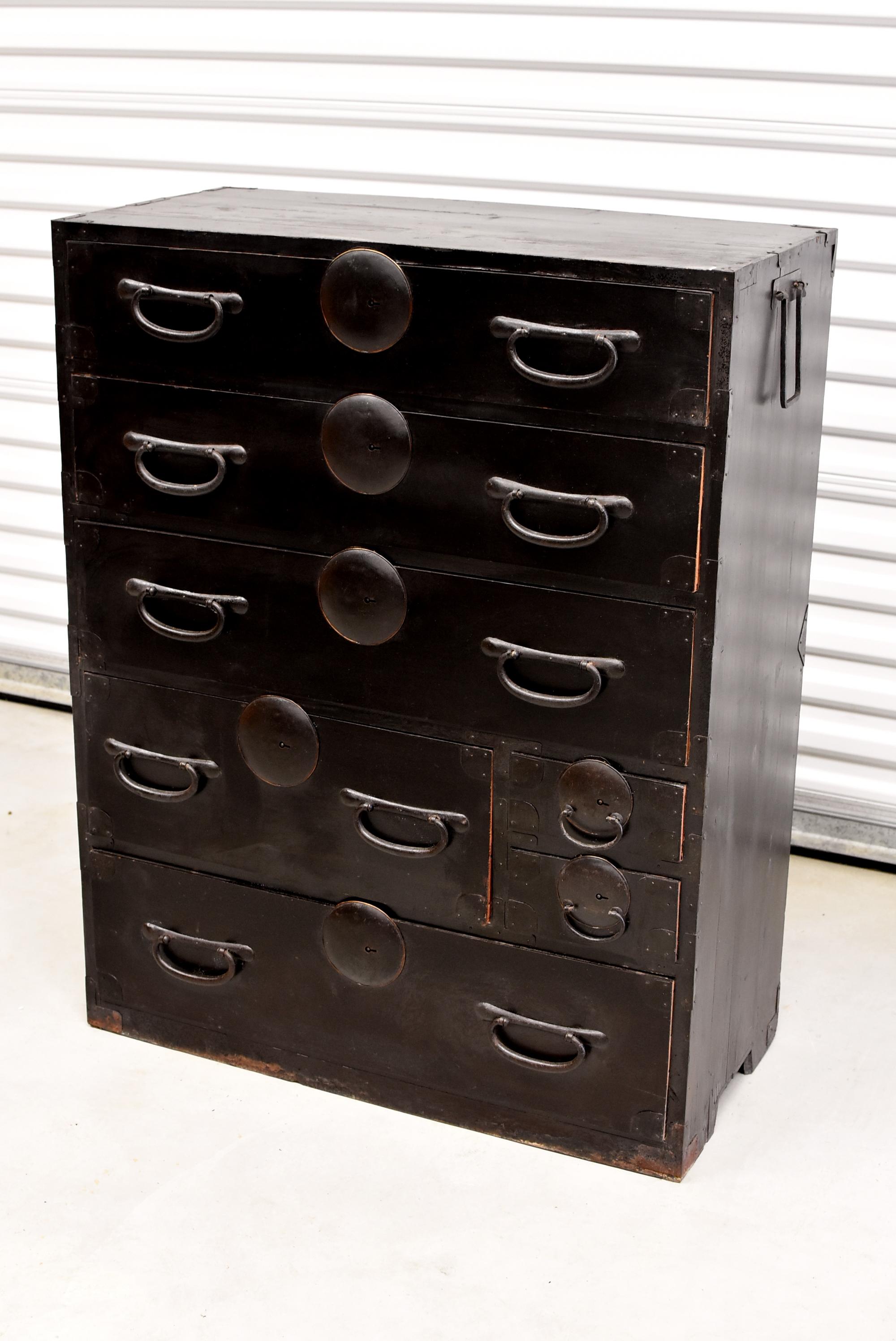 A beautiful vintage, Meiji Period, Japanese Tansu with seven full capacity drawers. Large, unique, solid iron and bronze hardware are simple and timeless. Side handles make moving a breeze. Solid wood. All original.
 