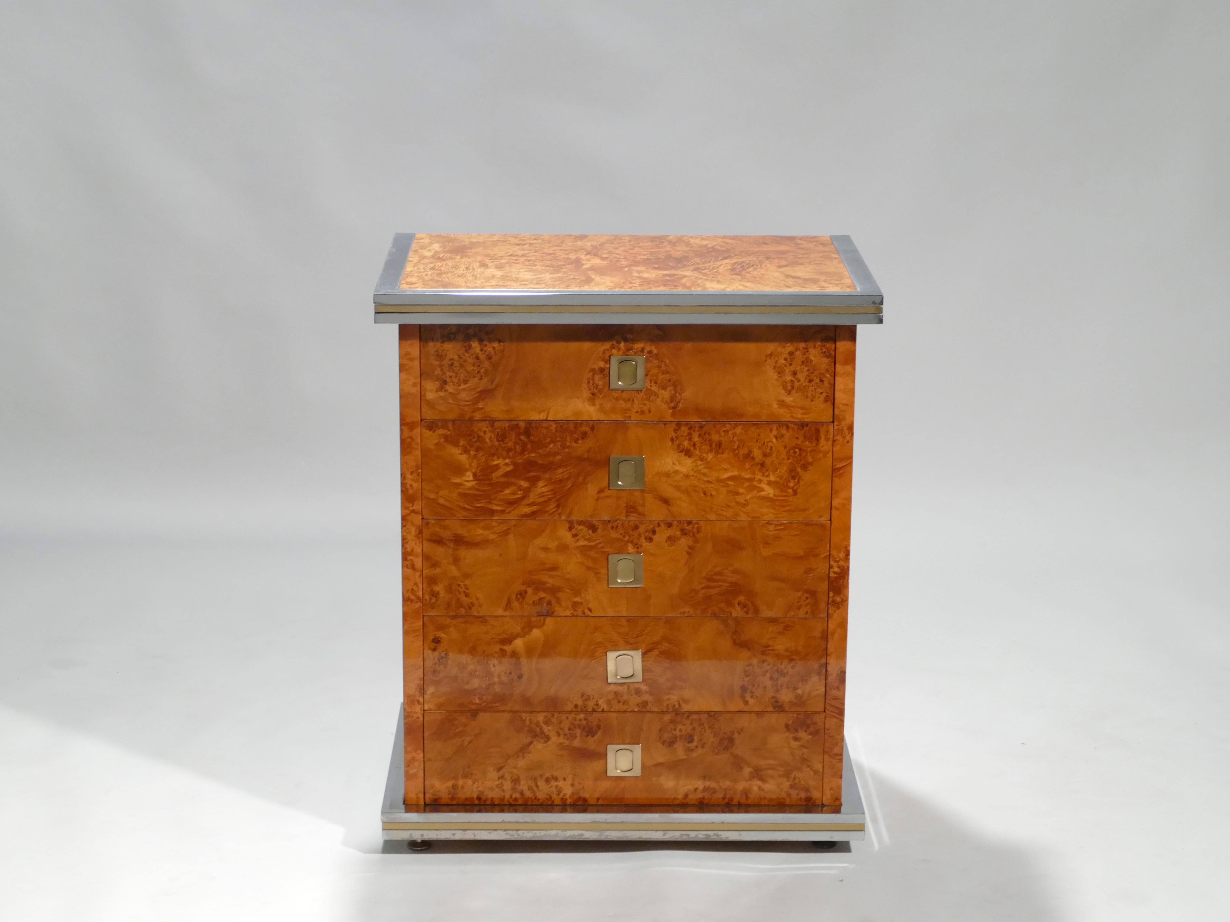 A rare and breathtaking piece by Willy Rizzo from the 1970s, this chest of drawers has a bright and high-end feel, a relic of his time designing for the glamorous members of the so-called dolce VITA. Rich lacquered burl wood makes up the bulk of the