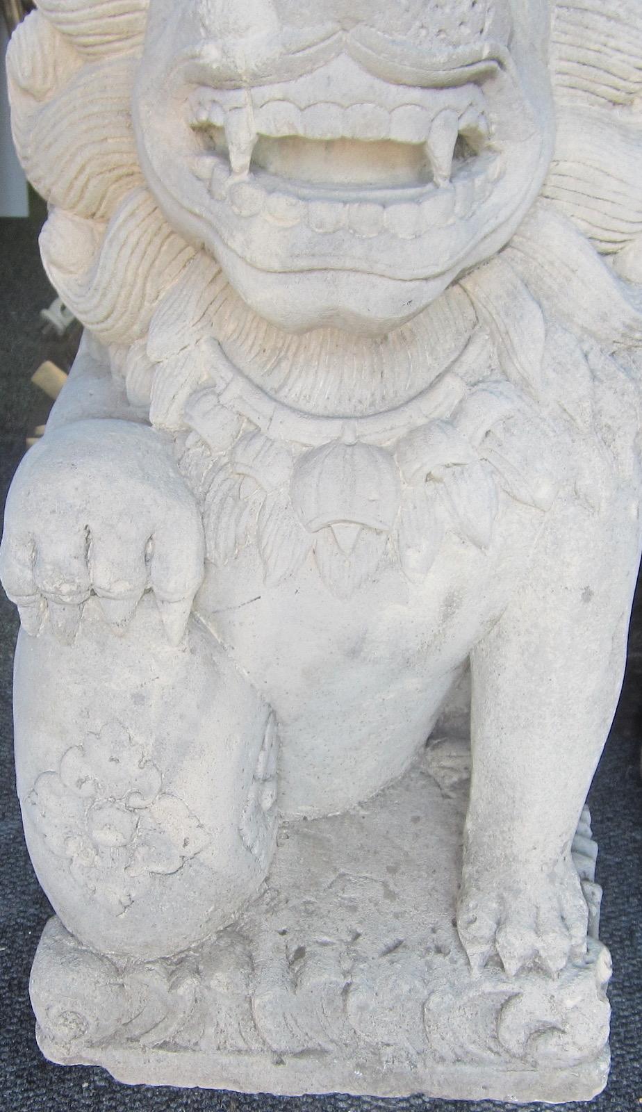 Pair of large Balinese carved limestone Lion Foo Dog Statues,
Imported, circa 1998,
weigh 135kg each.