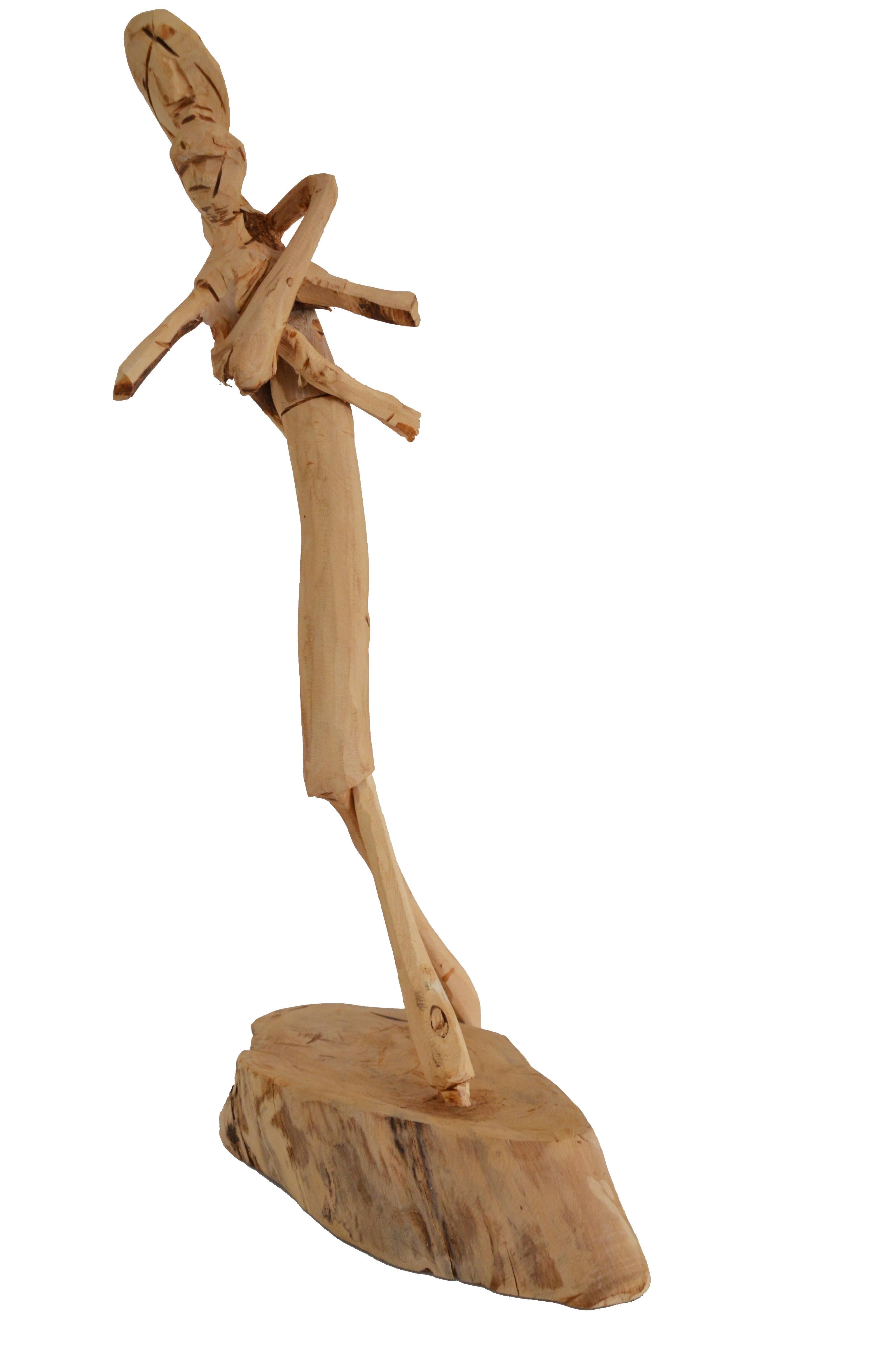 “Mother with Son” (originally entitled “Mulher com Filho”) is a unique piece by the Brazilian artist Cícero Rodrigues, from Petrolina, Pernambuco. Through the wood-carving, the artist manages to express the simultaneous roughness and simplicity of