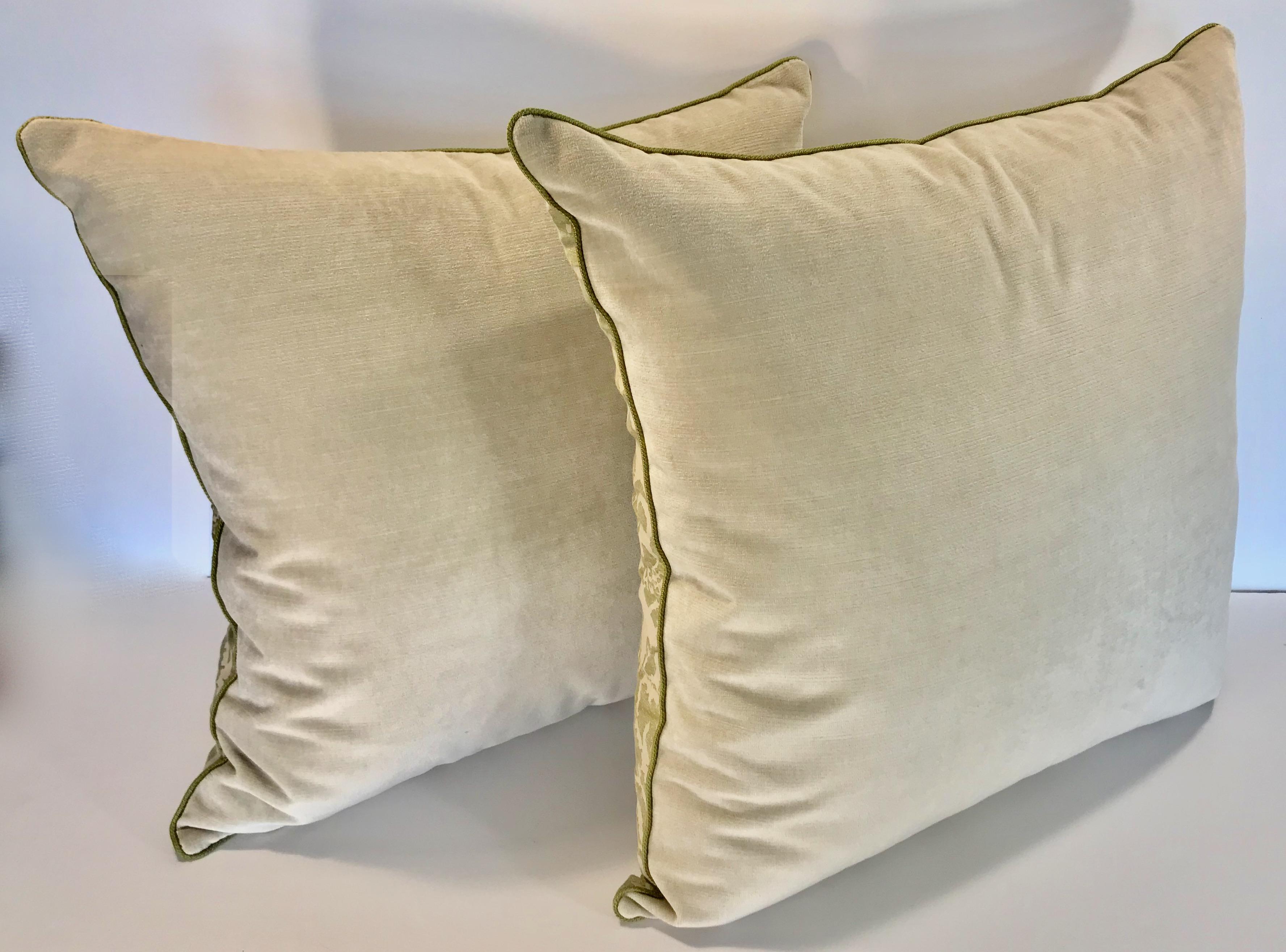 Beautiful pair of custom throw pillows crafted with vintage Mariano Fortuny cotton fabric in the Corone pattern. Linen blend velvet back with a coordinating green micro cord. 80/20 down blend feather inserts are overstuffed to 40 ounces.