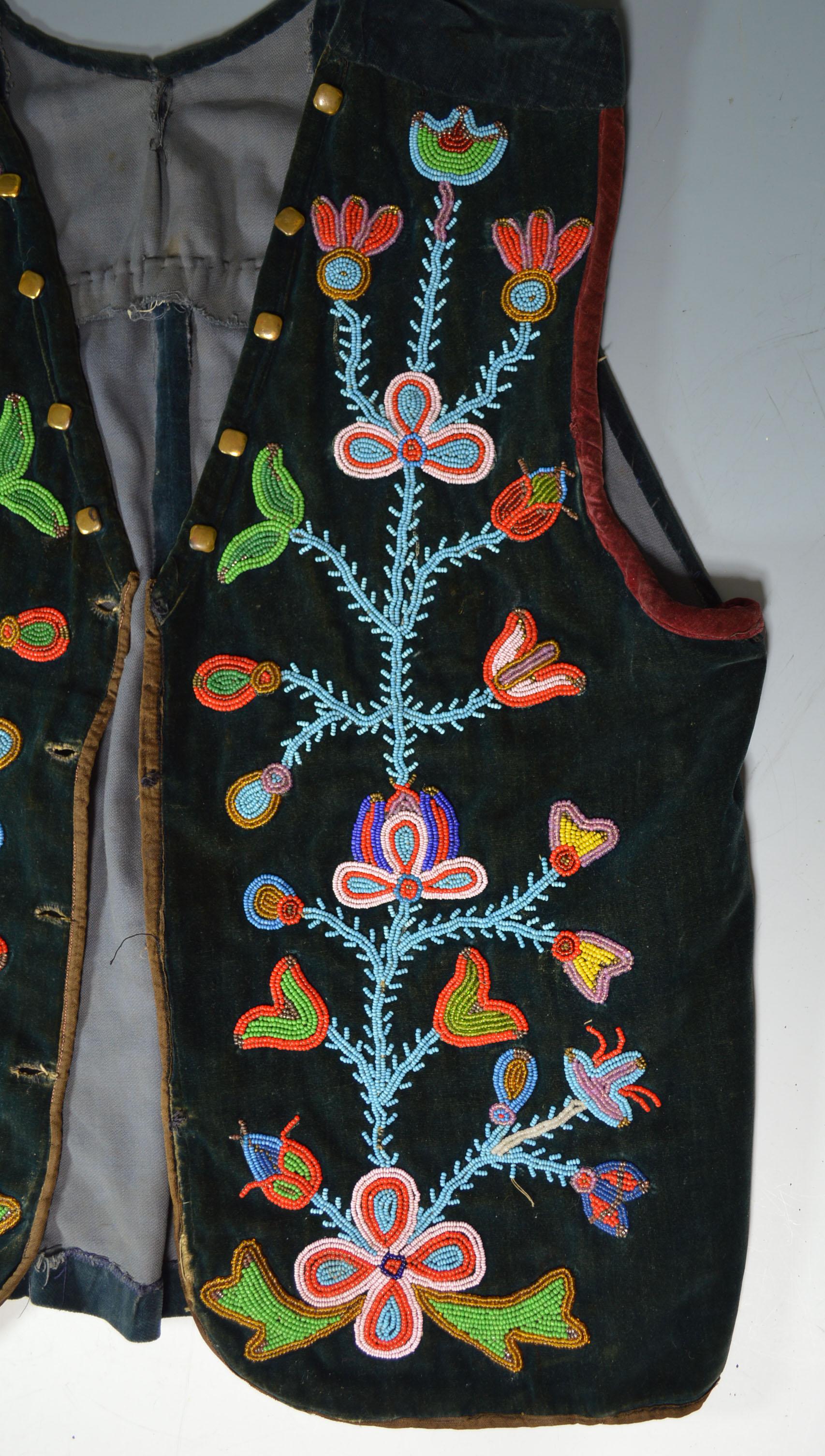 A fine Native American Ojibwe beaded waist coat

Finely beaded on the front with floral designs

Period: Eastern woodlands Canada Late 19th century early 20th century

Condition: Fine

Provenance: Acquired in Montreal Canada in 1926.


 