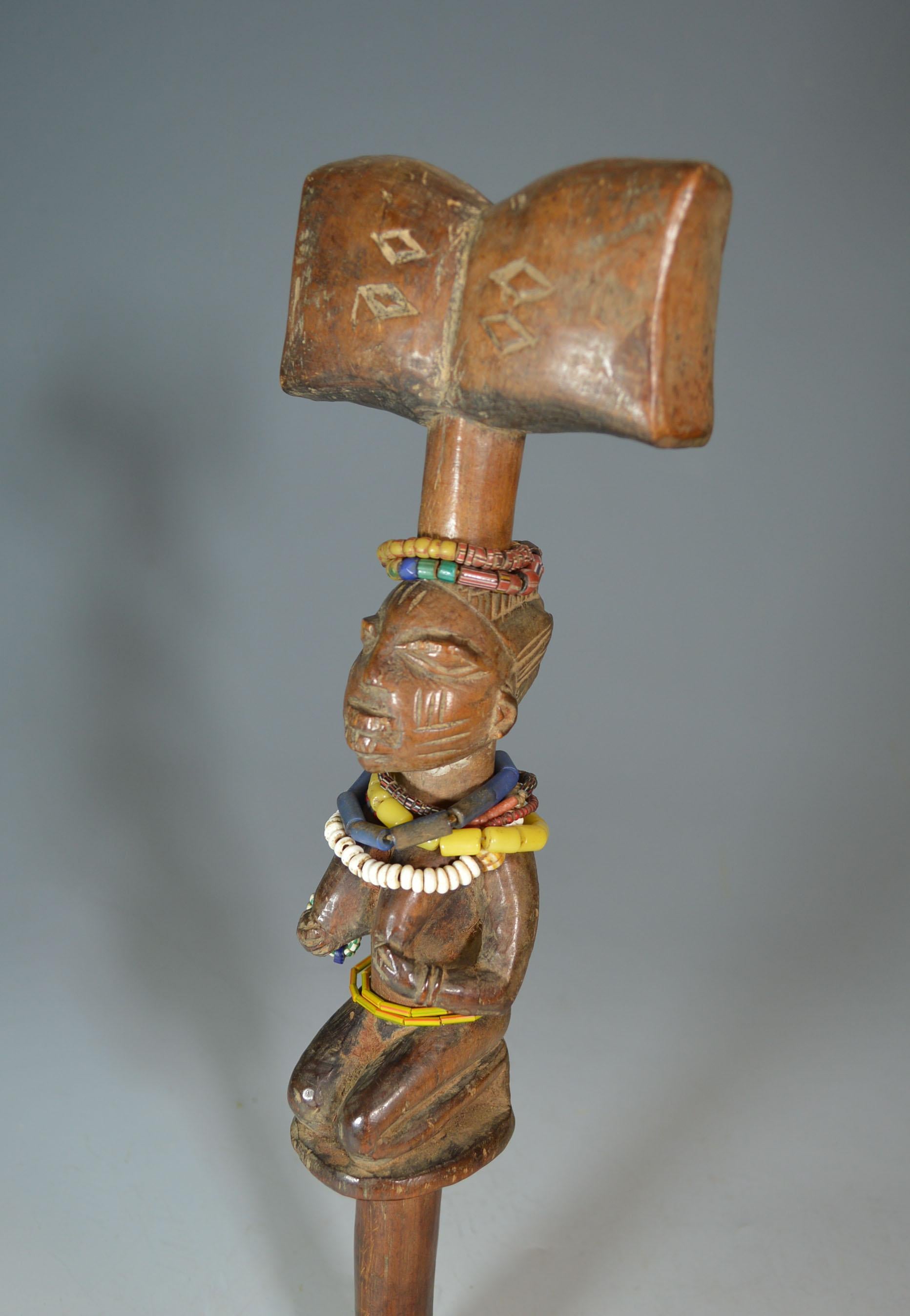 A fine old Yoruba Shango staff,
Very finely carved with excellent aged patina,
Adorned with numerous beads some of which are ancient trade beads
Yoruba Nigeria
Period: late 19th early 20th century
Ex US collection,
Measure: Height 35 cm, 14