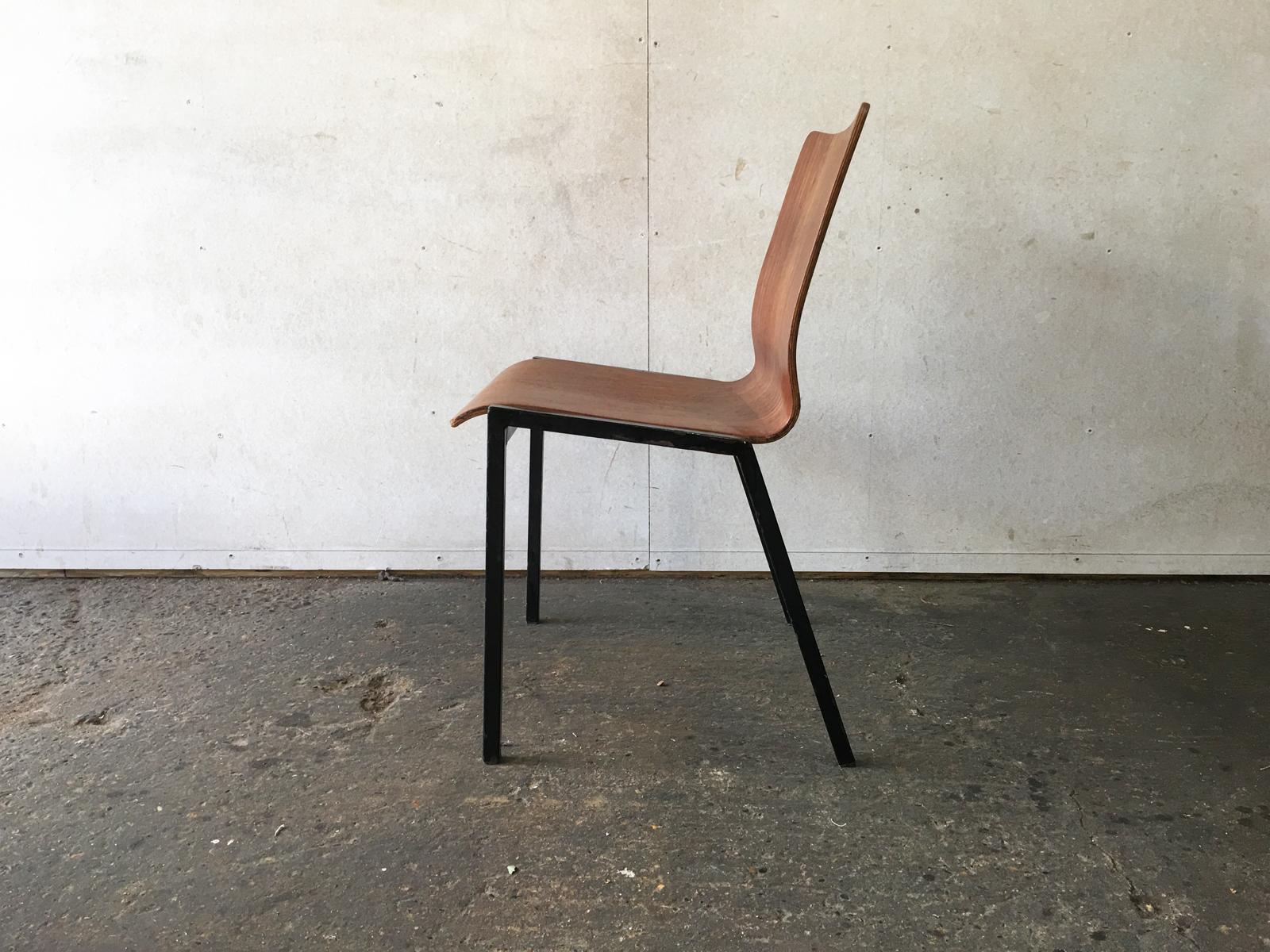 There are a large number of these chairs available, happy to sell any quantity of chairs. Discount on larger orders.

These are Danish chairs, with shaped bentwood seat with a rich wood grain finish. The sit on black painted metal frames. 70