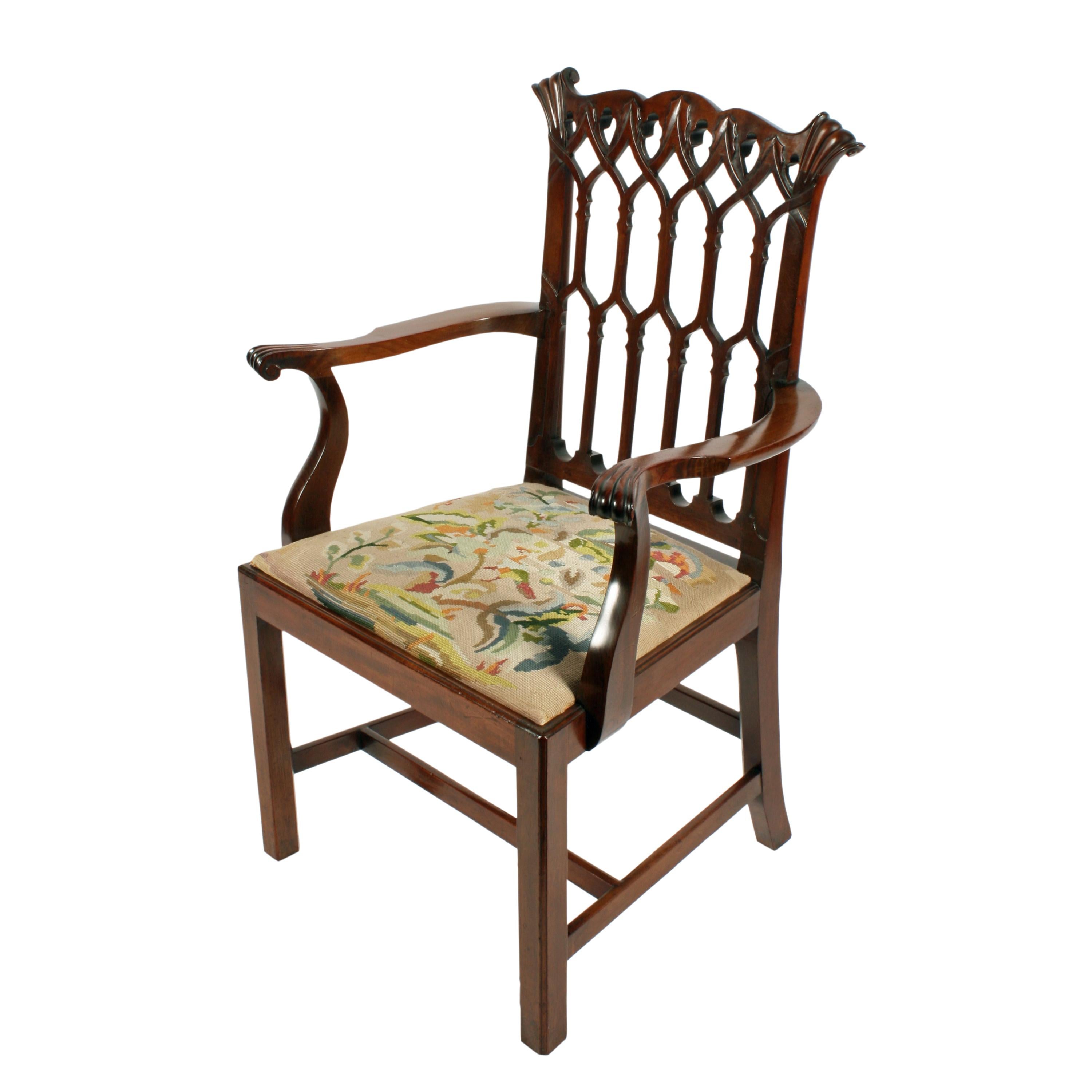 Chinese Chippendale style armchair.


A late 19th century mahogany Chinese Chippendale style armchair.

The chair has a high back with carved scroll corners and a lattice work centre.

The shaped arms have elbow rests and a scroll where your