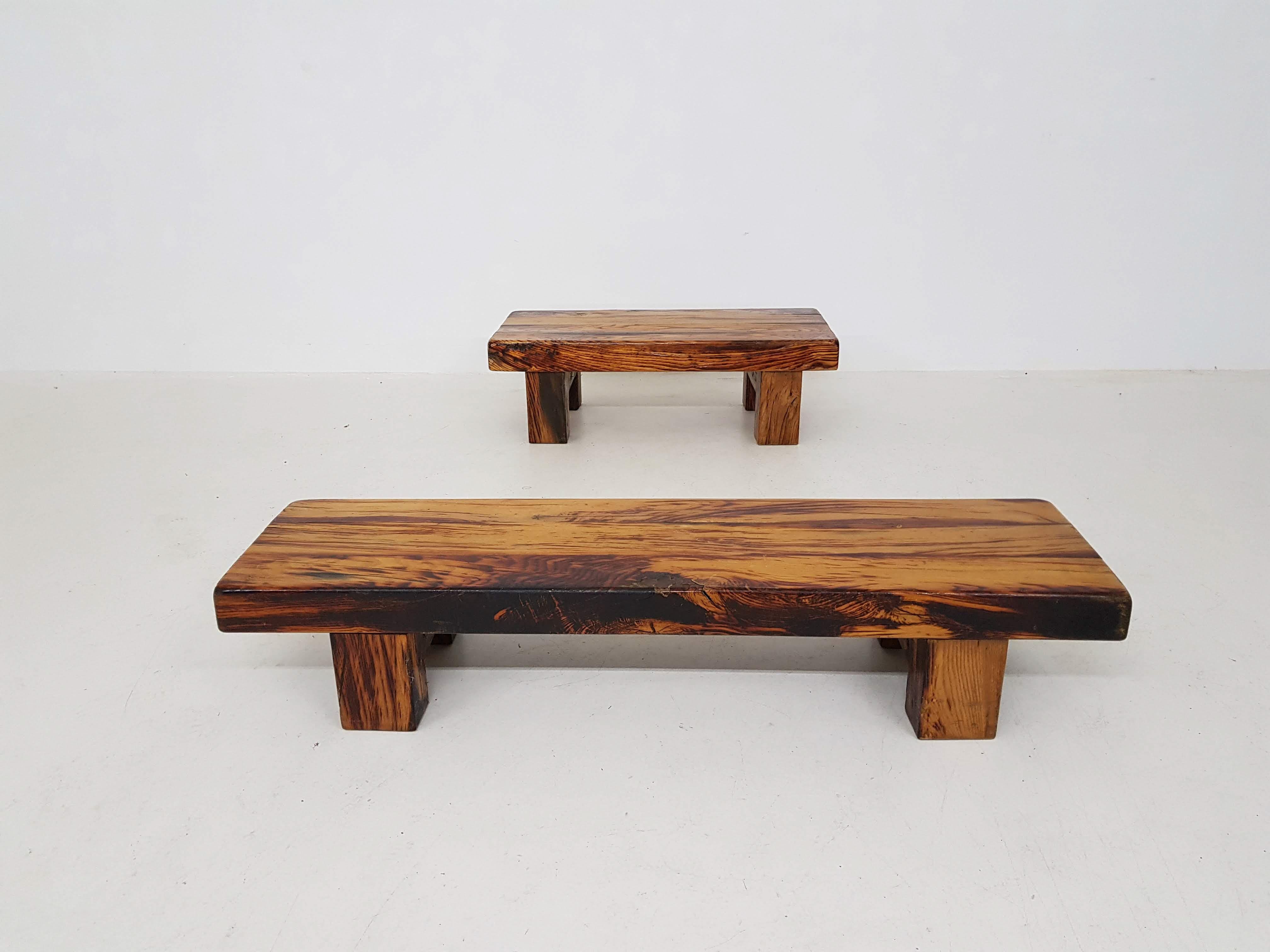 Set of two vintage solid heavy benches, coffee tables or side tables. Aged beautifully! In the style of Charlotte Perriand.

Very heavy and beautiful quality wood in good condition.

Measurements: 

Small: 
42,55 cm depth
36 cm high
115 cm