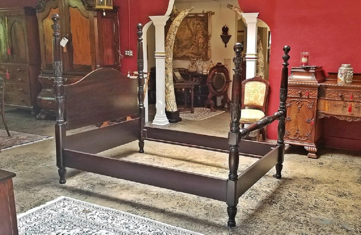 Presenting a rare 19th century American mahogany rice four-poster bed.

This is a 'full' sized bed ... not a Queen or King.

From circa 1880 and made of solid mahogany.

In the Charleston Style, South Carolina.

Beautiful carving on all four