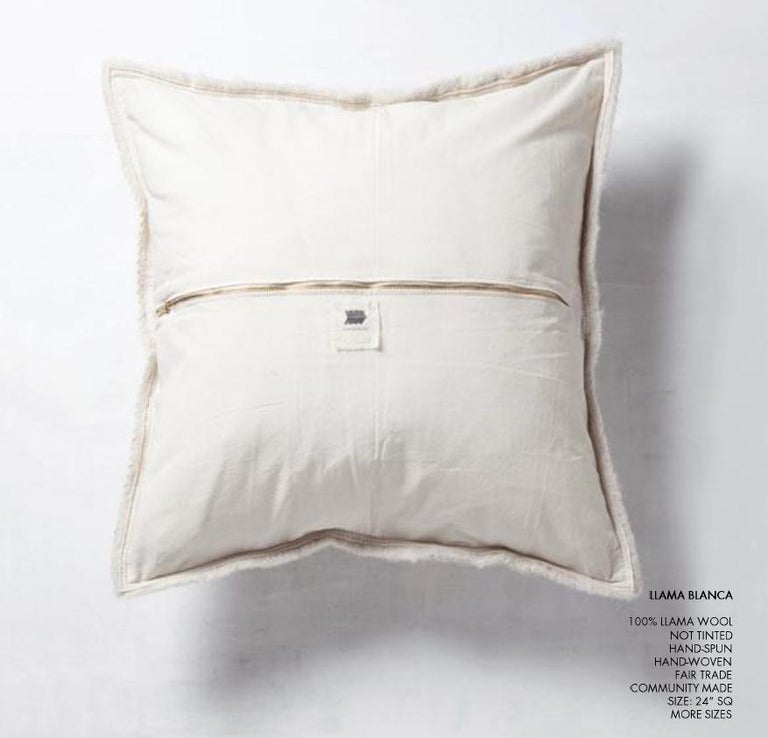 This dreamy and super soft pillow is made of 100% Llama wool, hand woven in the remote Northern part of Argentina's Dry Forrest. The entire process from shearing to final finish is done within the same family or community. The reverse side of the