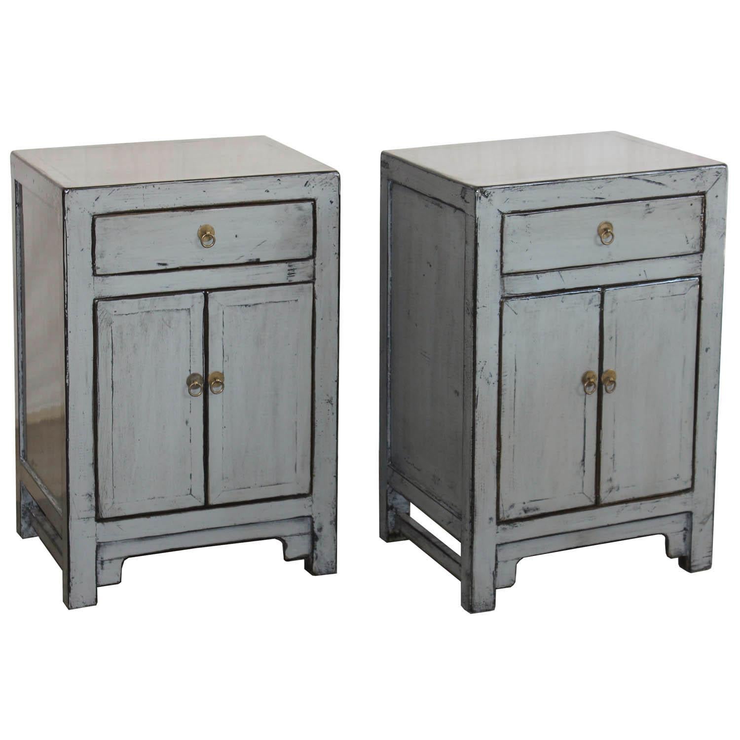 Contemporary one drawer gray lacquer side chest with clean lines and hand rubbed edges can be used as side chests next to a sofa or used as a bedside chest.