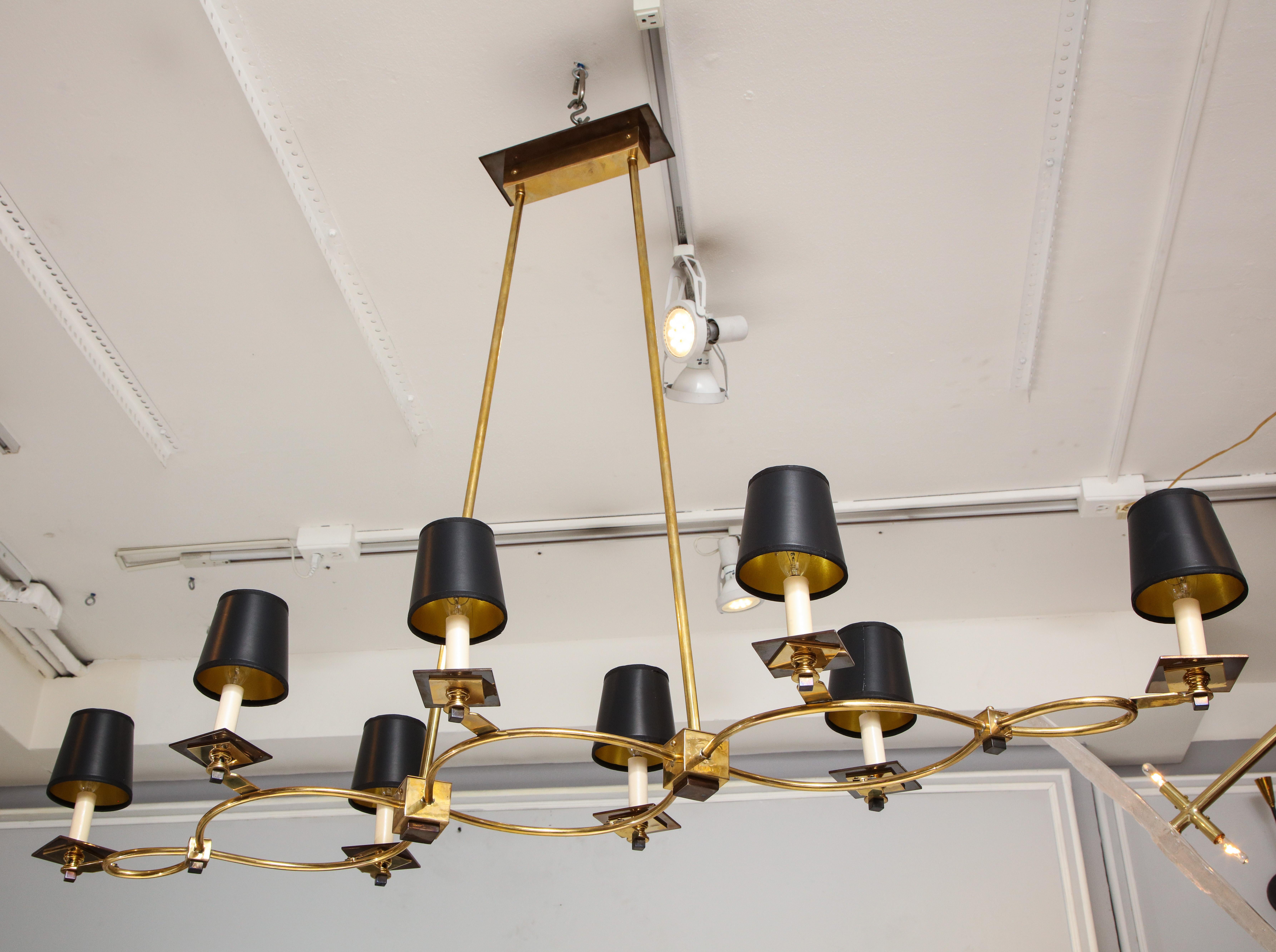 Midcentury style custom brass and bronze eight-arm fixture.
This fixture is customizable to your specifications with a lead time of 8-10 weeks.