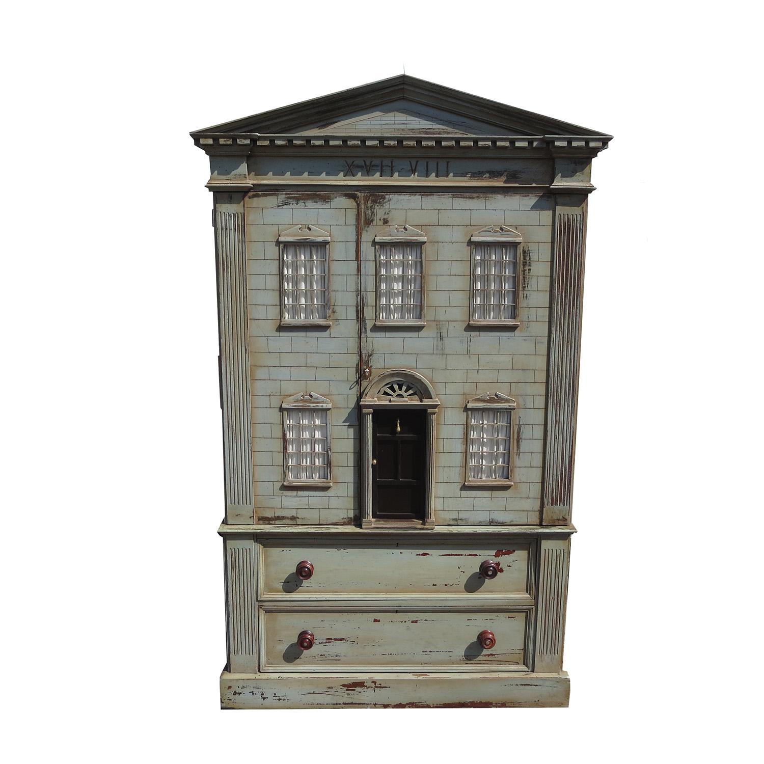 This charming cabinet was designed to resemble a large building. The exterior surfaces are hand painted and show intended wear. The top section lifts off the drawers and base for easy moving. The top opens to reveal removable shelves, while the