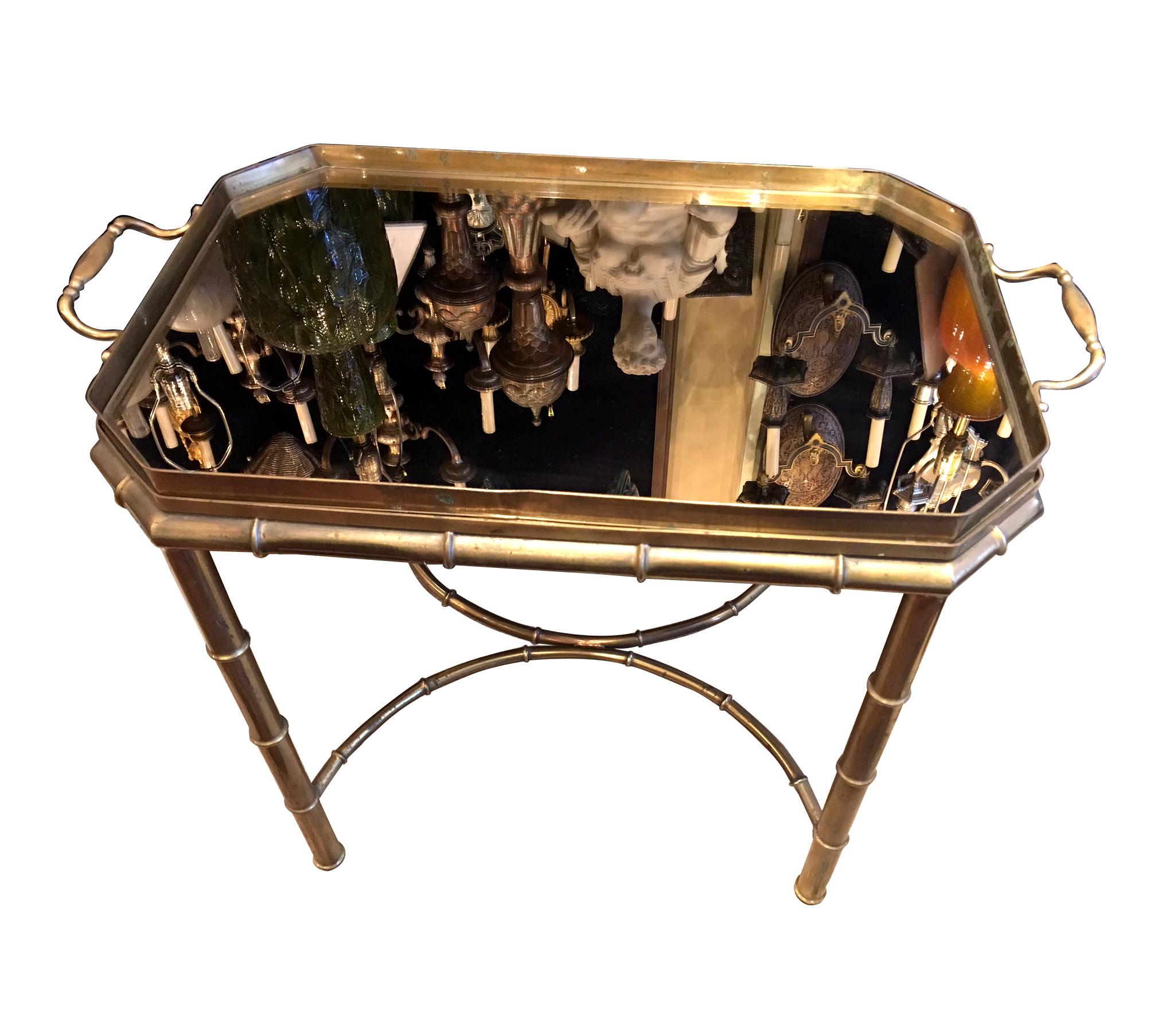 A French mirror-top bamboo shaped tray coffee table with original patina, circa 1940s. Tray lifts off for service.

Measurements:
Height: 21