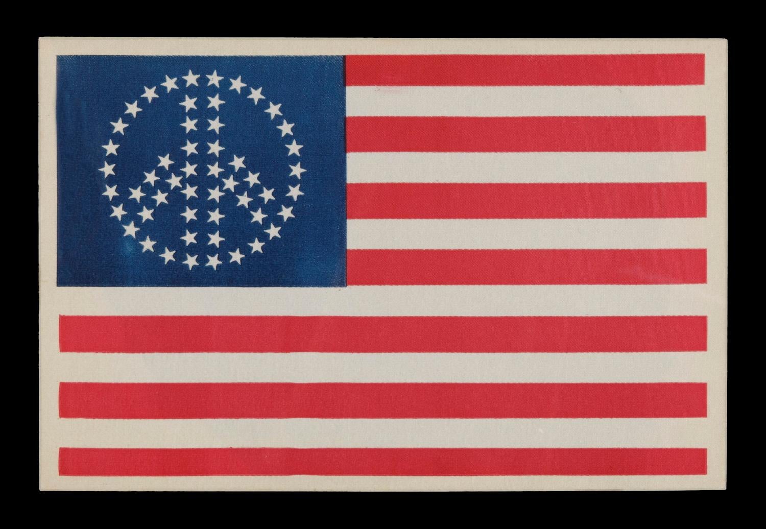 52 STAR AMERICAN FLAG CLOTH JACKET EMBLEM WITH PEACE SYMBOL CONFIGURATION, CA 1964-1975 

This unusual flag image is great for two reasons. One is the rather obvious fact that its stars are arranged in the form of the international symbol for peace,