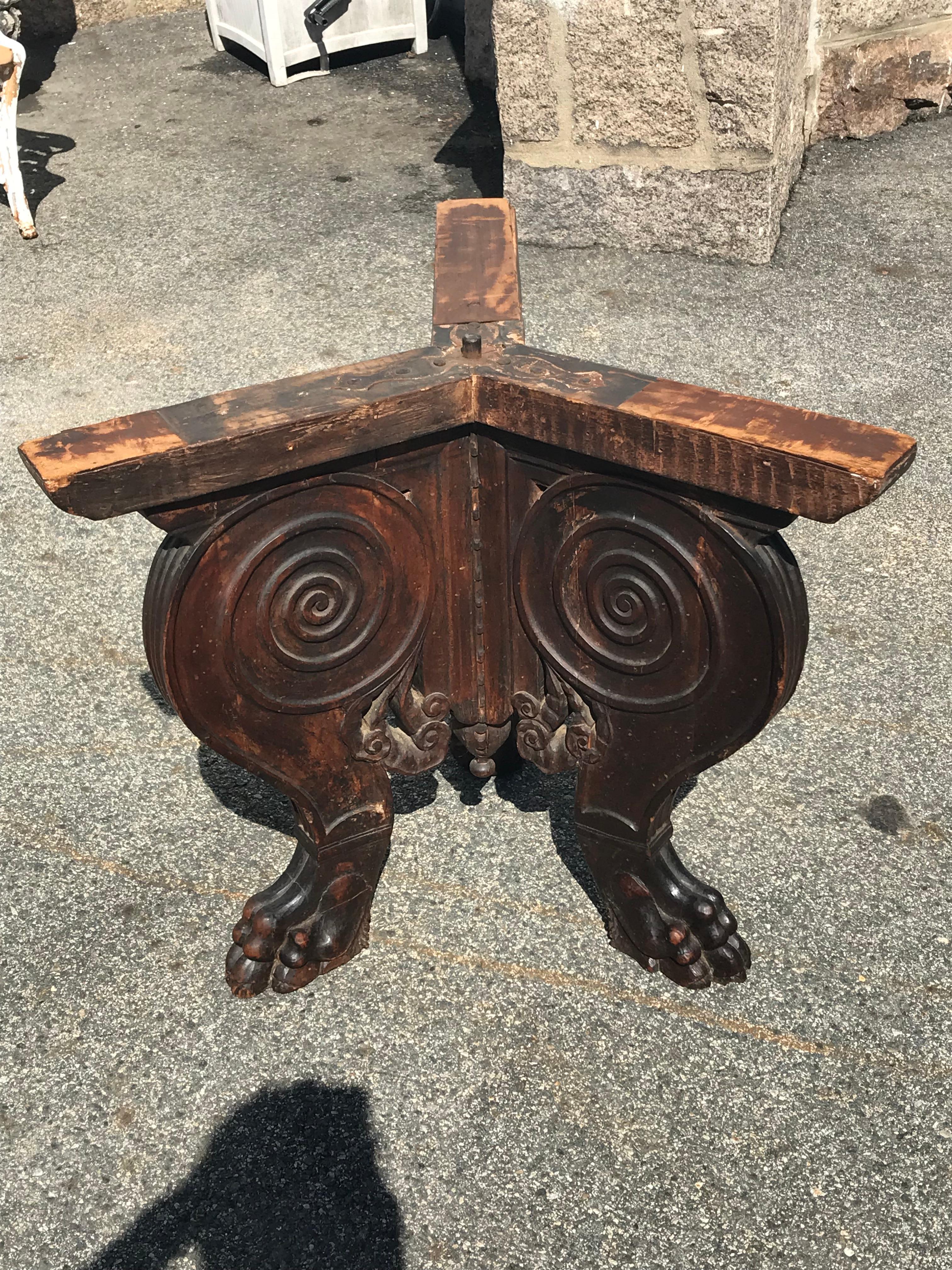 16th or 17th century Italian walnut and mixed woods centre table

Lion paw feet. Tripartate base. Very early finish on base. Great patina. Possible period Renaissance.