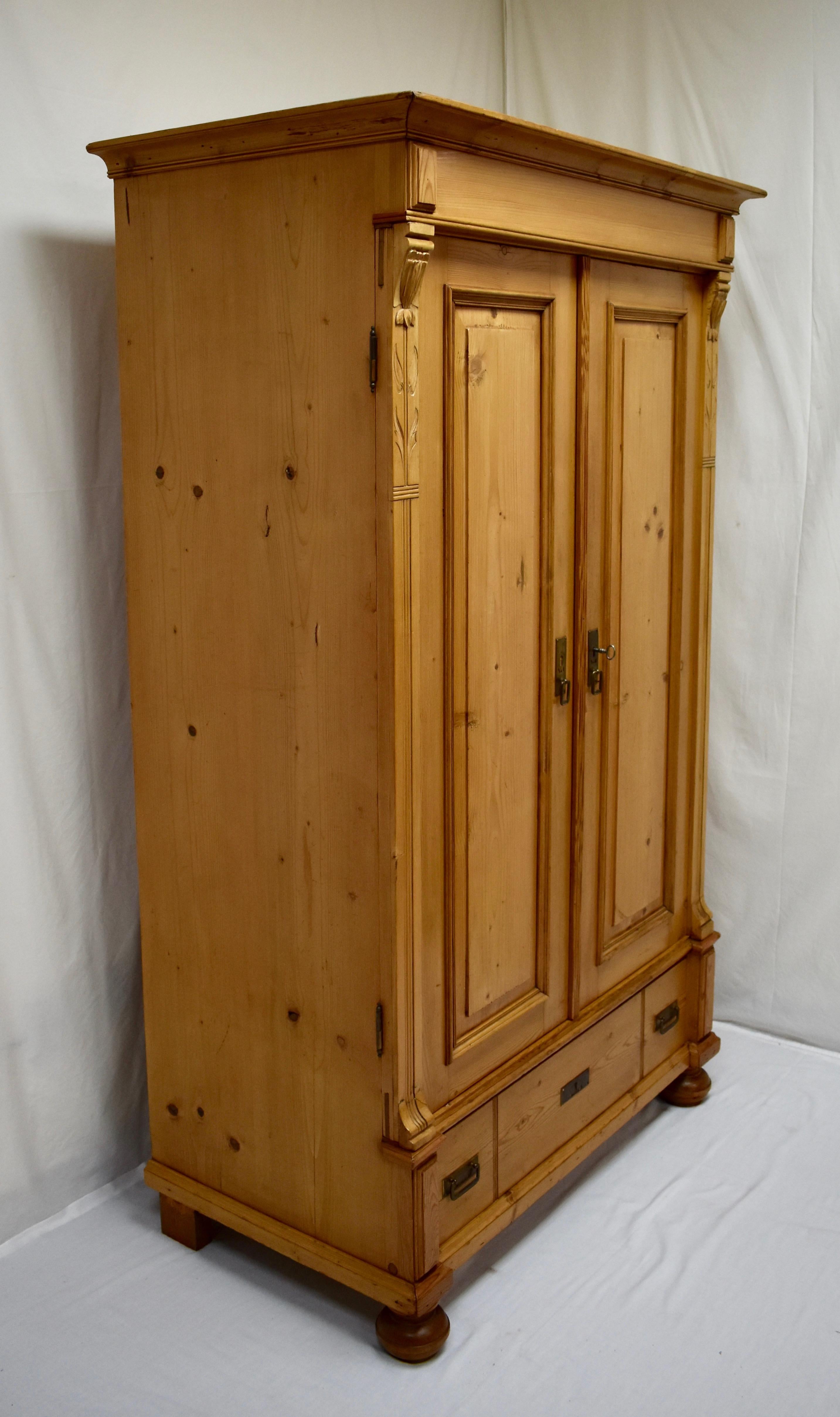 ANG01 Small Pine Two-Door Armoire 43.5x22x71H  Germany, circa 1910 $1795.00
This  lovely little armoire is as elegant as it is well-made.  Beneath a boldly-swept crown molding are two wide-swinging doors, each with a single raised panel, bordered by