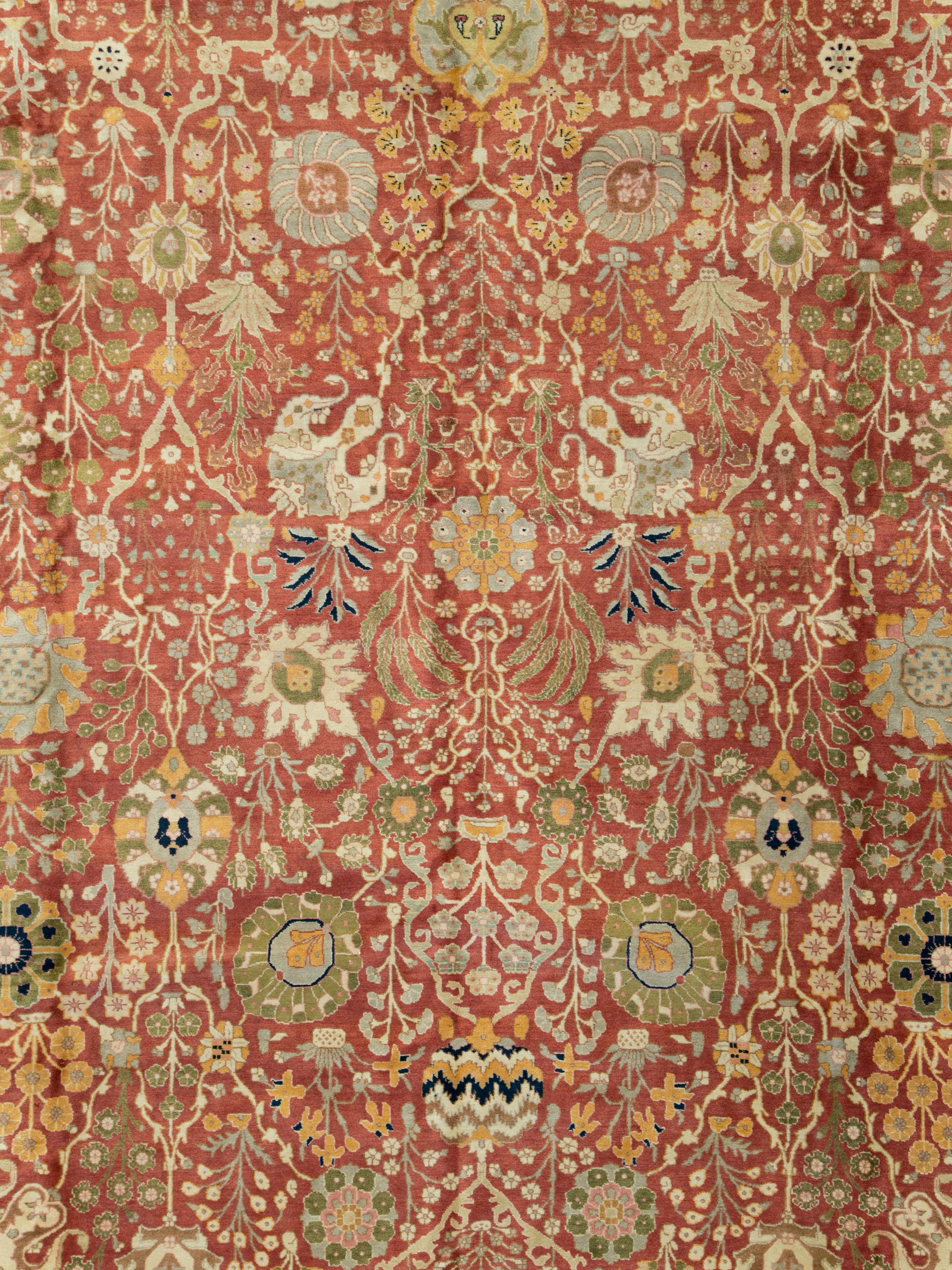 A vintage Persian Tabriz carpet from the mid-20th century.