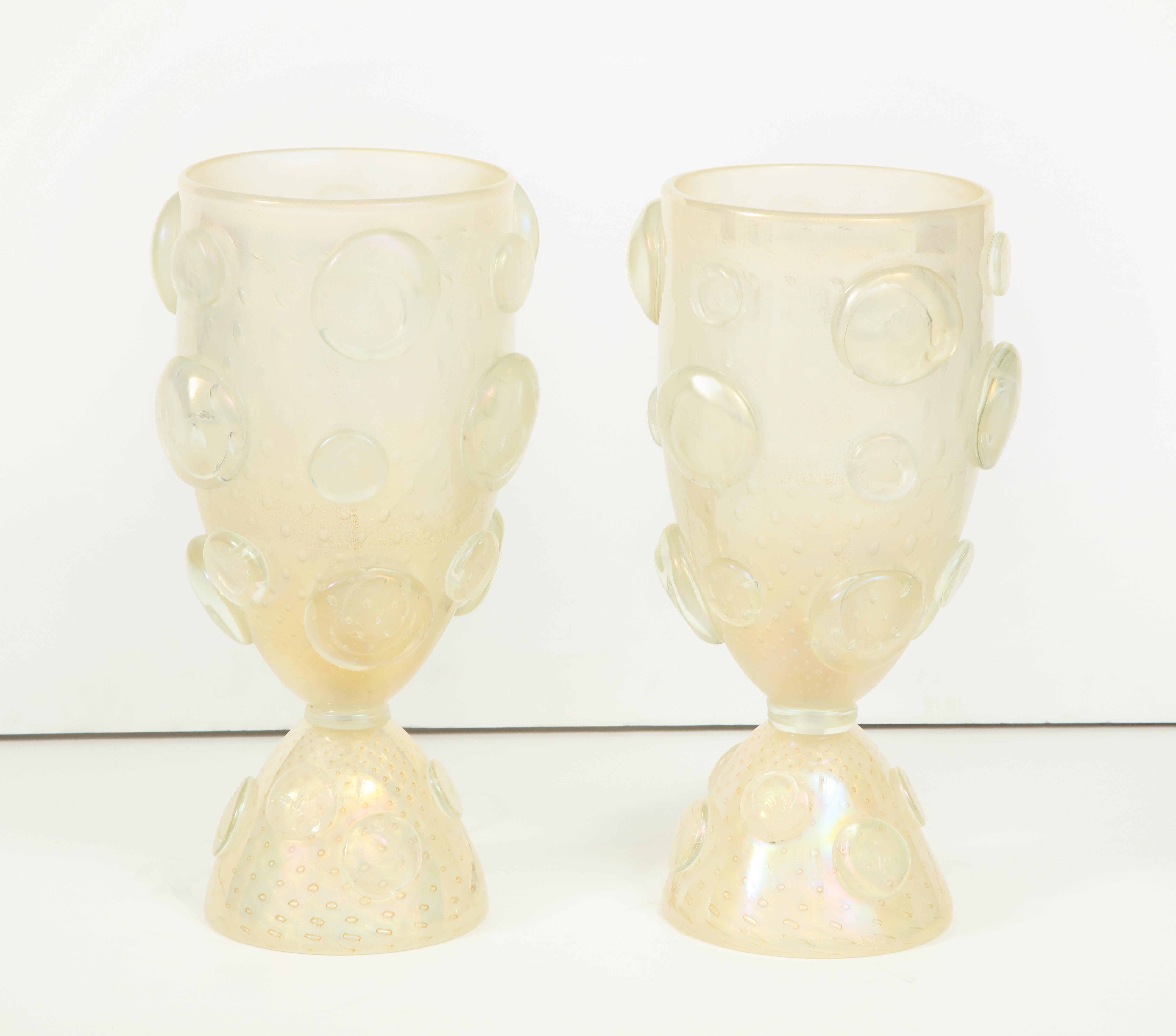 This pair of large vase or urn lamps consist of handblown 