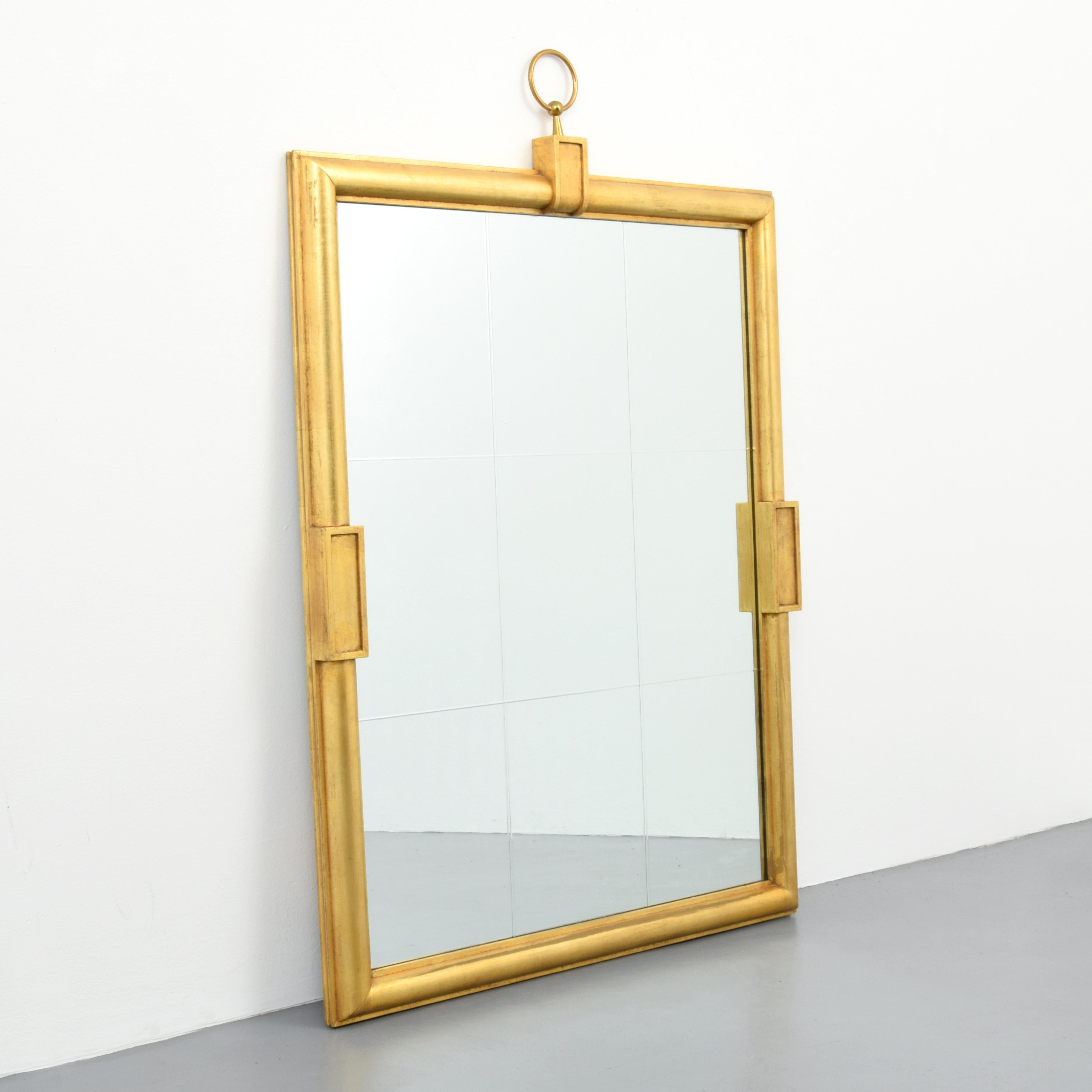 Large miror by Tommi Parzinger for Parzinger Originals.

Tommi Parzinger's meticulous detail in his early work as a silversmith was carried over into his design career.  He favored costly materials that allowed him to achieve a luxurious and elegant