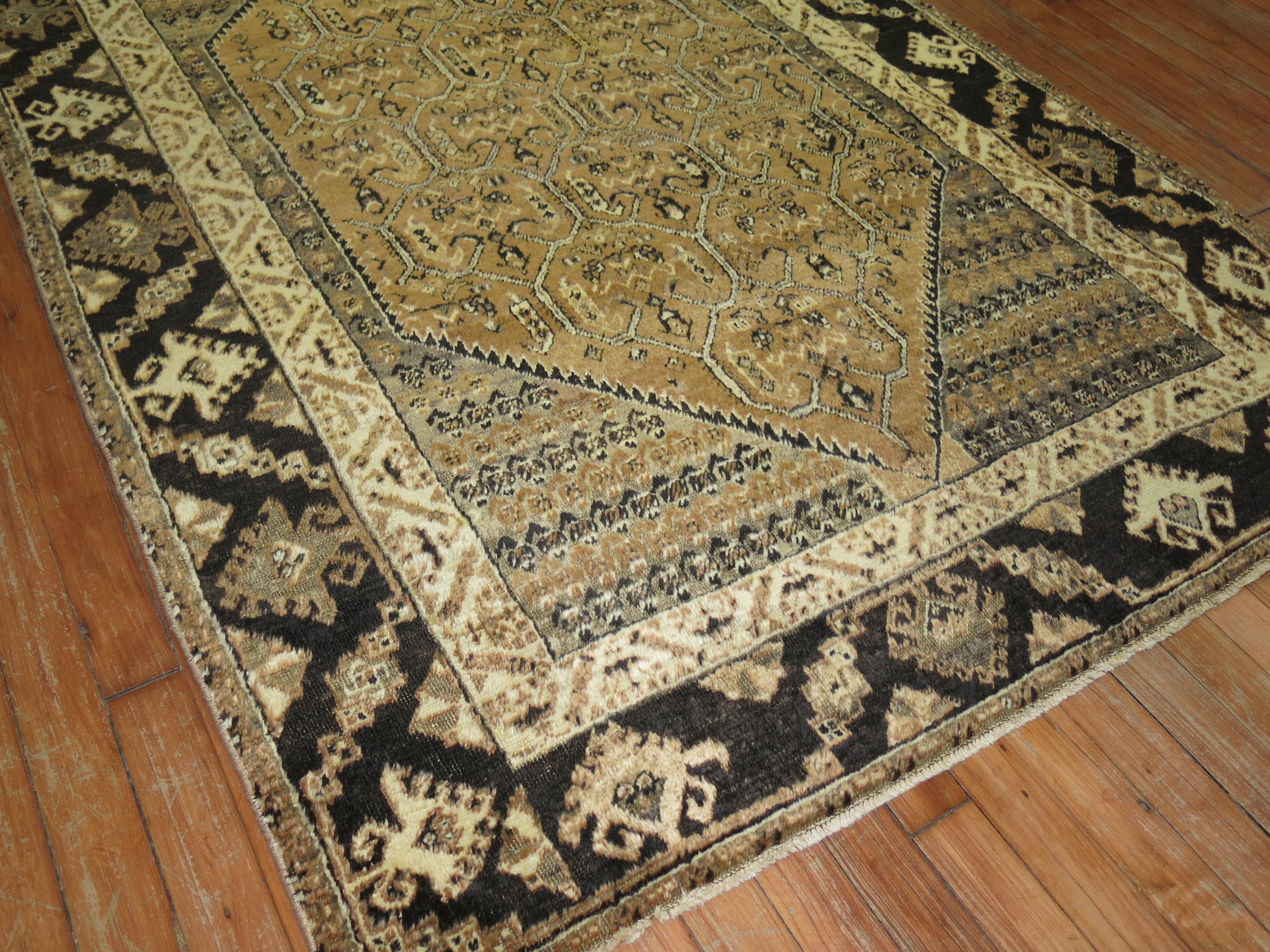Caramel and brown color vintage Turkish rug.