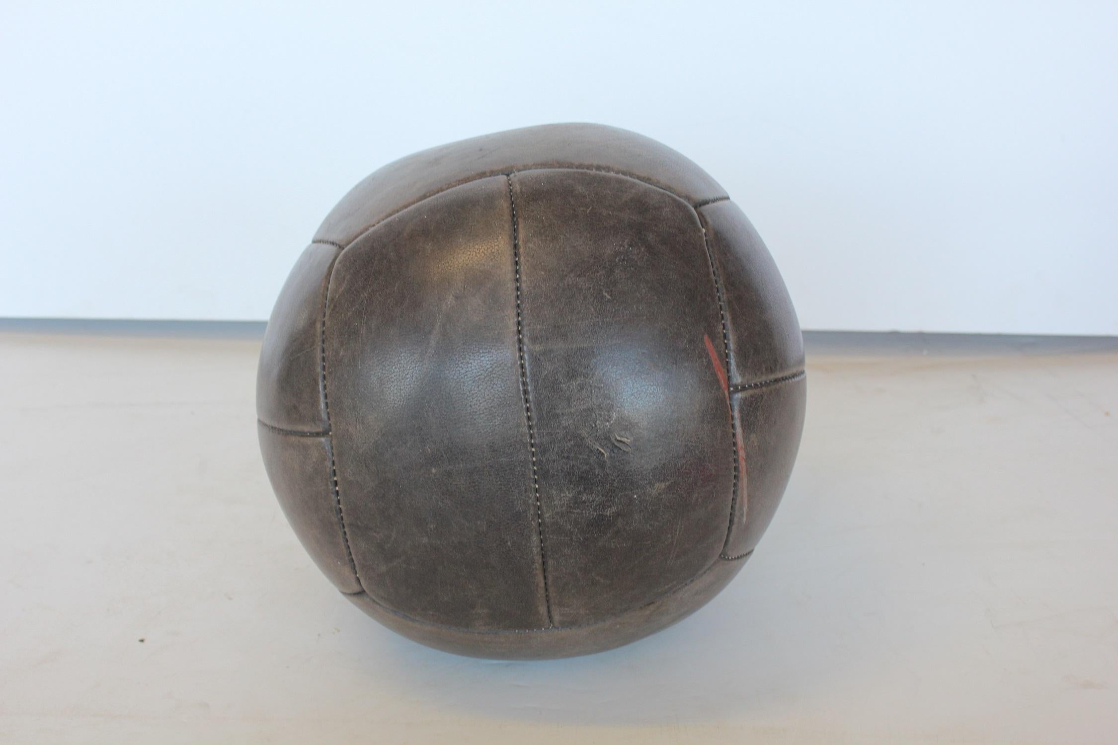 Vintage leather hand-stitched medicine ball.