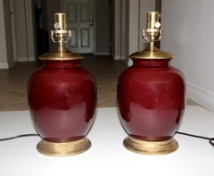 Pair of Asian Oxblood Porcelain Lamps