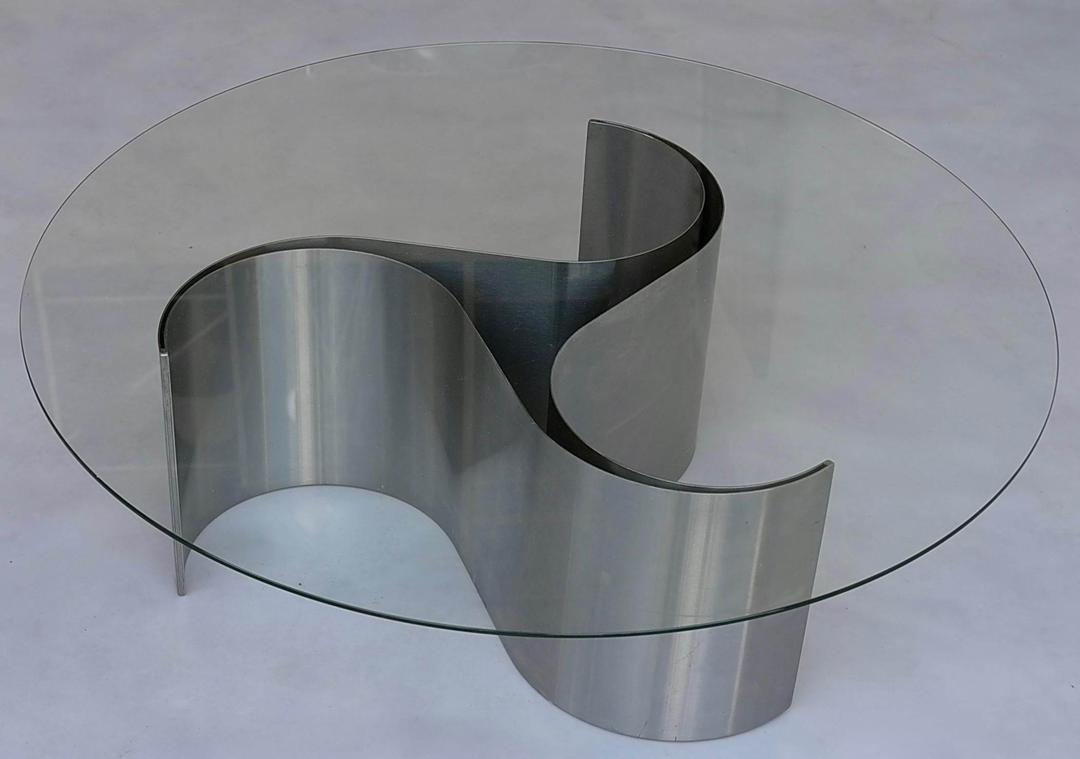 Sculptural coffee table model 'Comete' in glass and steel by Patrice Maffei, France, 1970s.