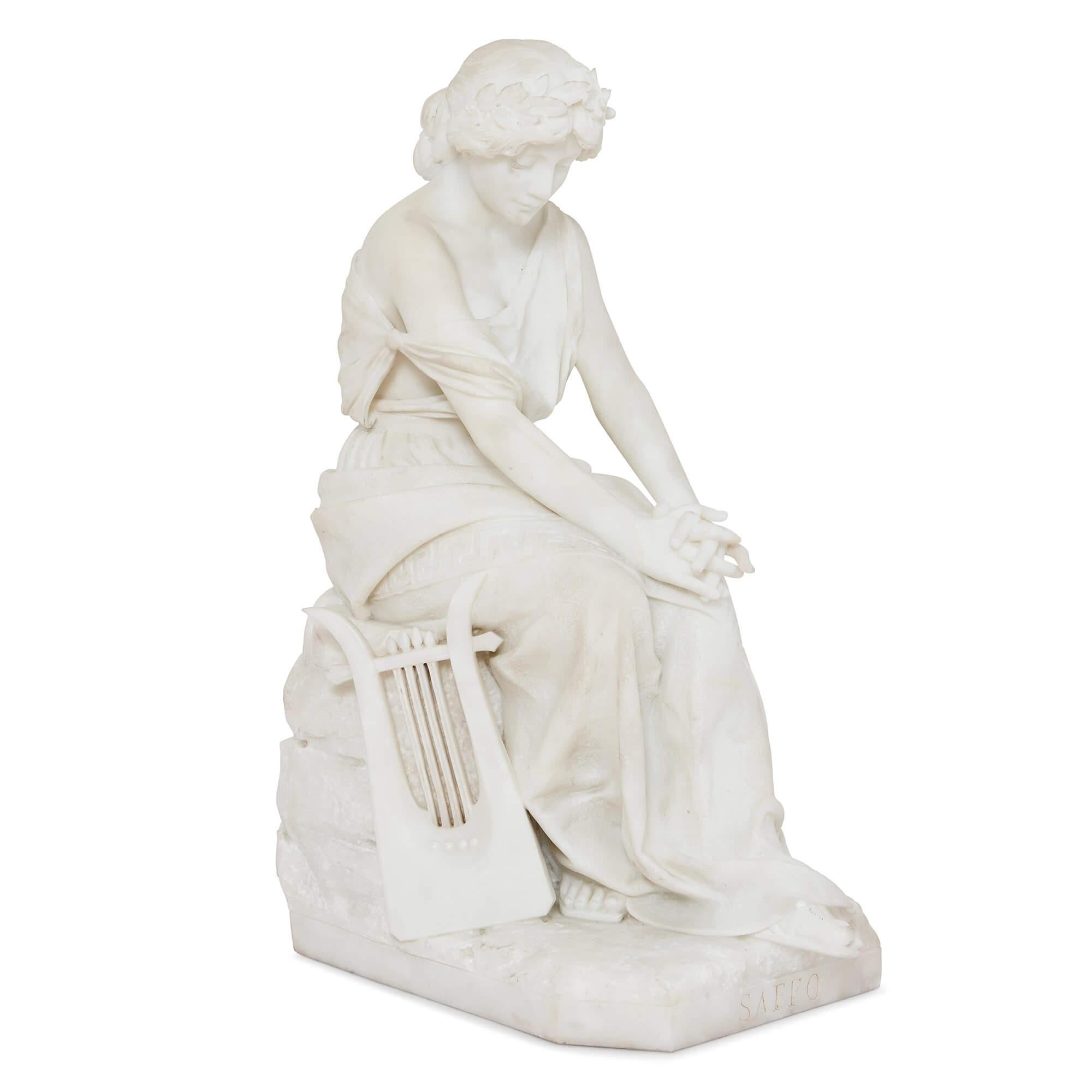 This marble sculpture of the Greek poet Sappho was created in Florence by the esteemed Polish sculptor, Mieczyslaw Leon Zawiejski. Sappho is depicted in a seated position with her hands clasped together on her knee and her eyes lowered. She wears a