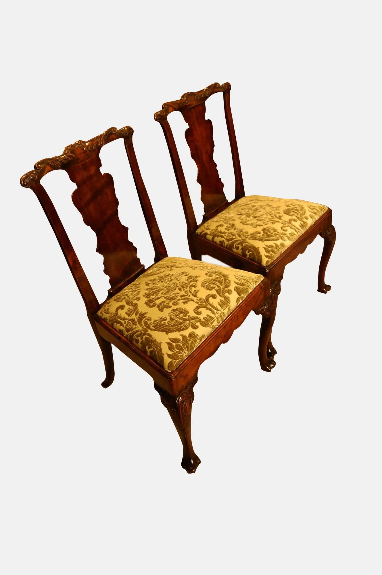 A fine and rare pair of George III cabriole chairs

The top rail has leafy scrolling acanthus above solid bluster shaped splats 

The legs also carved with acanthus

Possibly Irish

circa 1740.