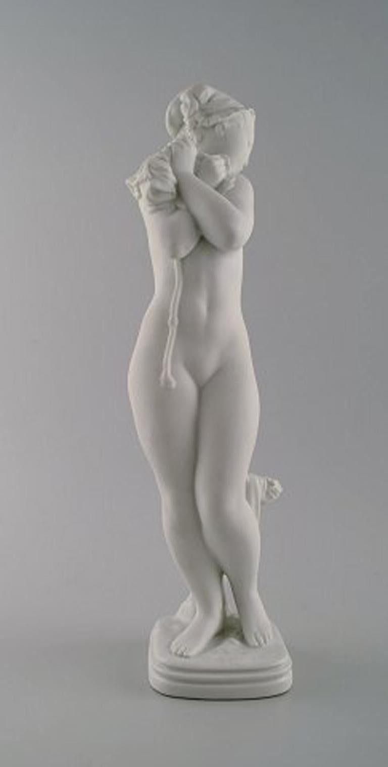 Gerhard Henning for Royal Copenhagen. 'Girl bathing'. Designed 1924. Porcelain and biscuit.
Stamped, model no. 134.
Measures: Height 34.5 cm, diameter 8.5 cm.
In perfect condition. 1st. factory quality.