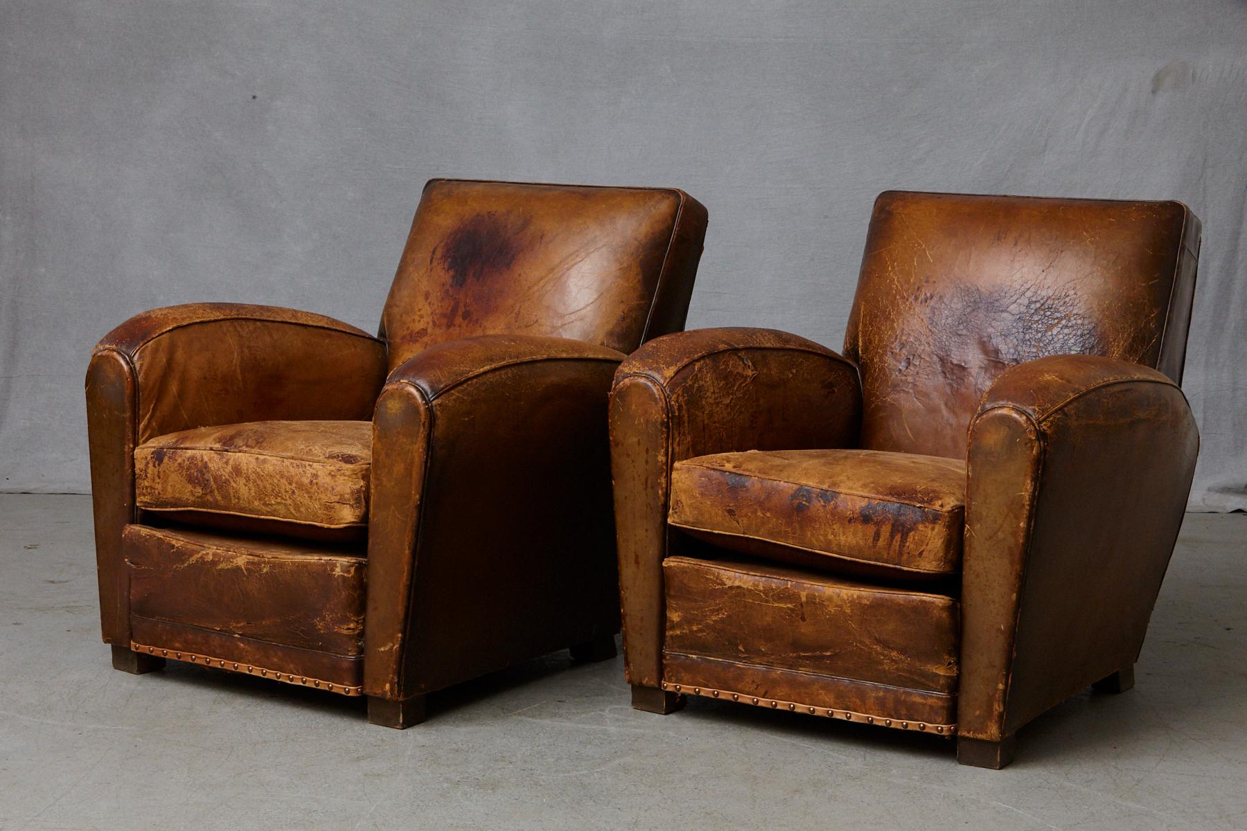 Art Deco Pair of Large Distressed French Leather Fauteuils or Club Chairs, circa 1930s