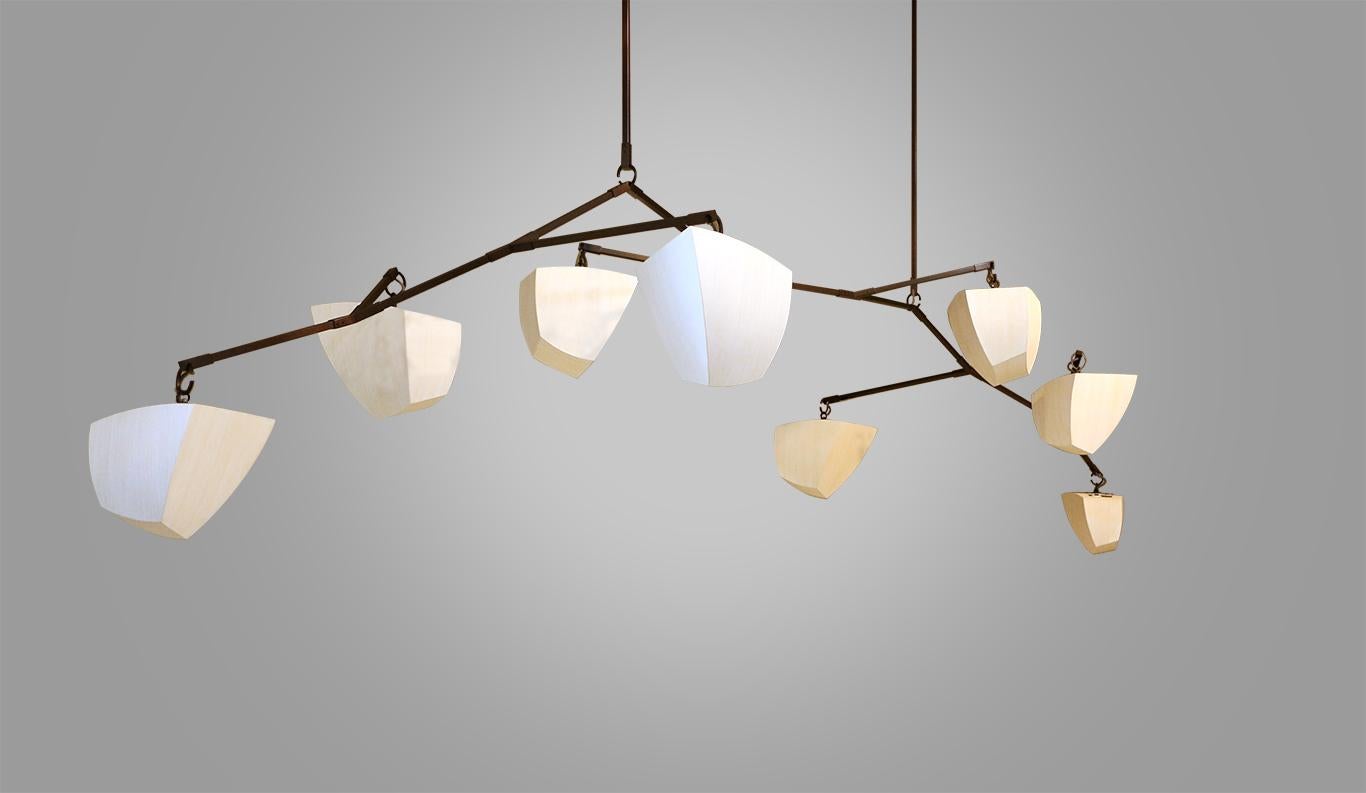 Our unique mobile “kit of parts” chandelier can be configured into many variations, extended both vertically and horizontally. We do standard and custom sizes. We work closely with our designers to explore what will work perfectly for their