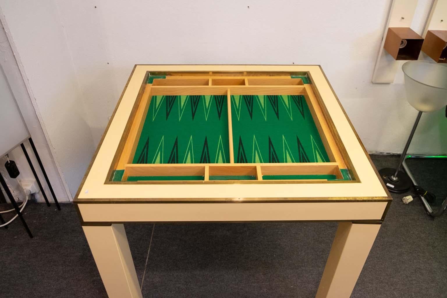 Mid-Century Modern Lacquered Ivory and Brass Game Table Designed by Jean-Claude Mahey