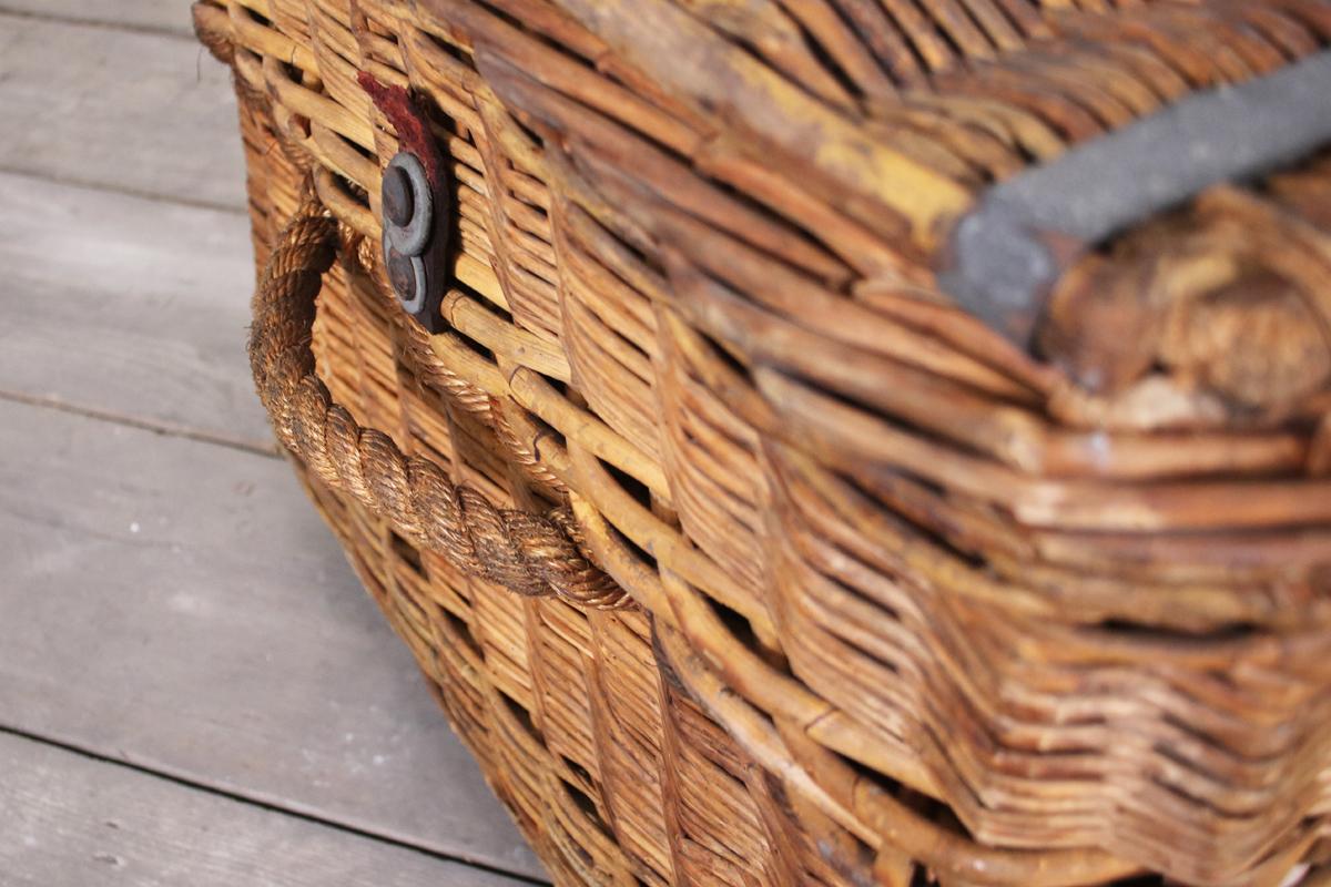 Huge Early 20th Century Vintage Willow Basket with Iron Casters 1