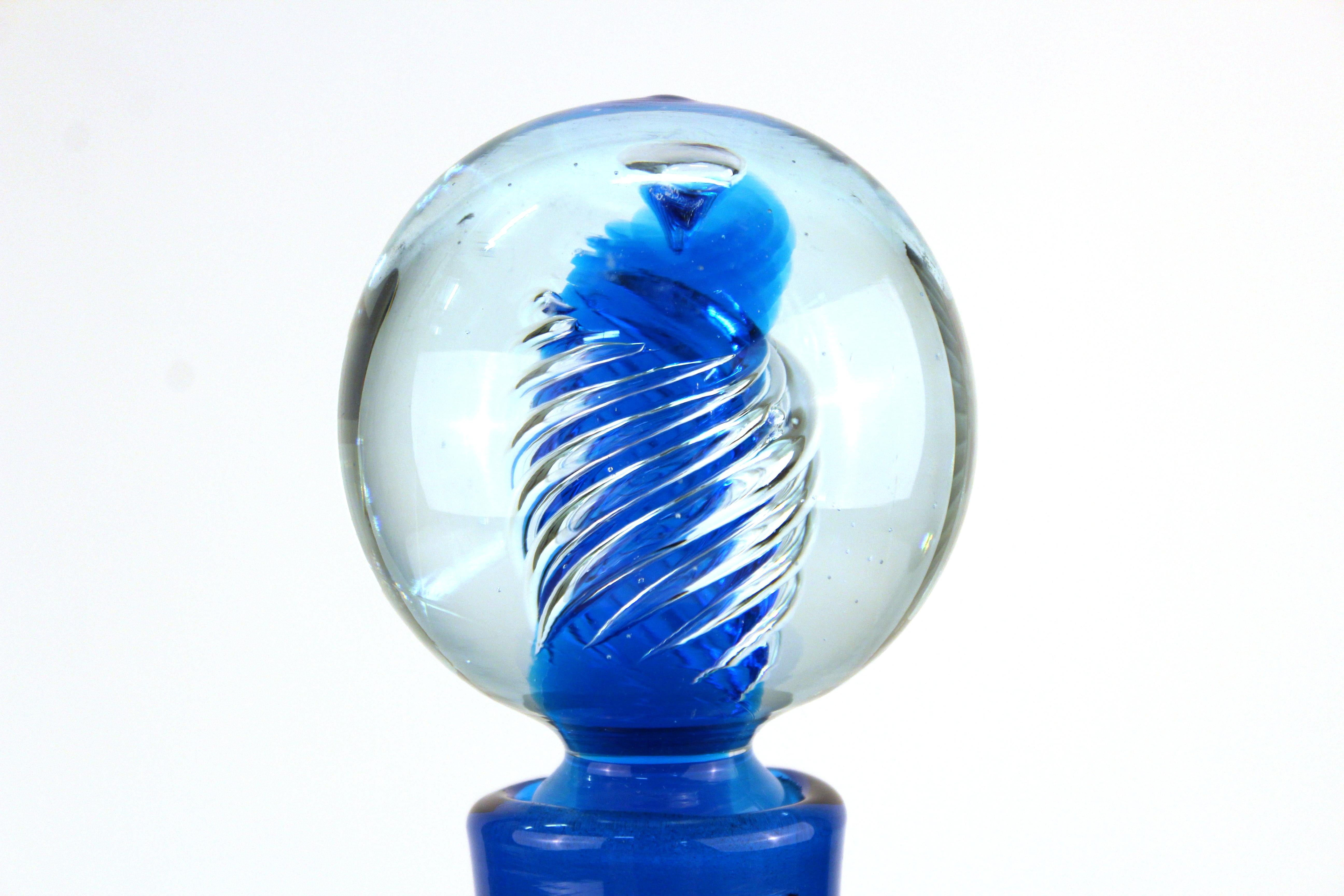blue glass decanter with stopper
