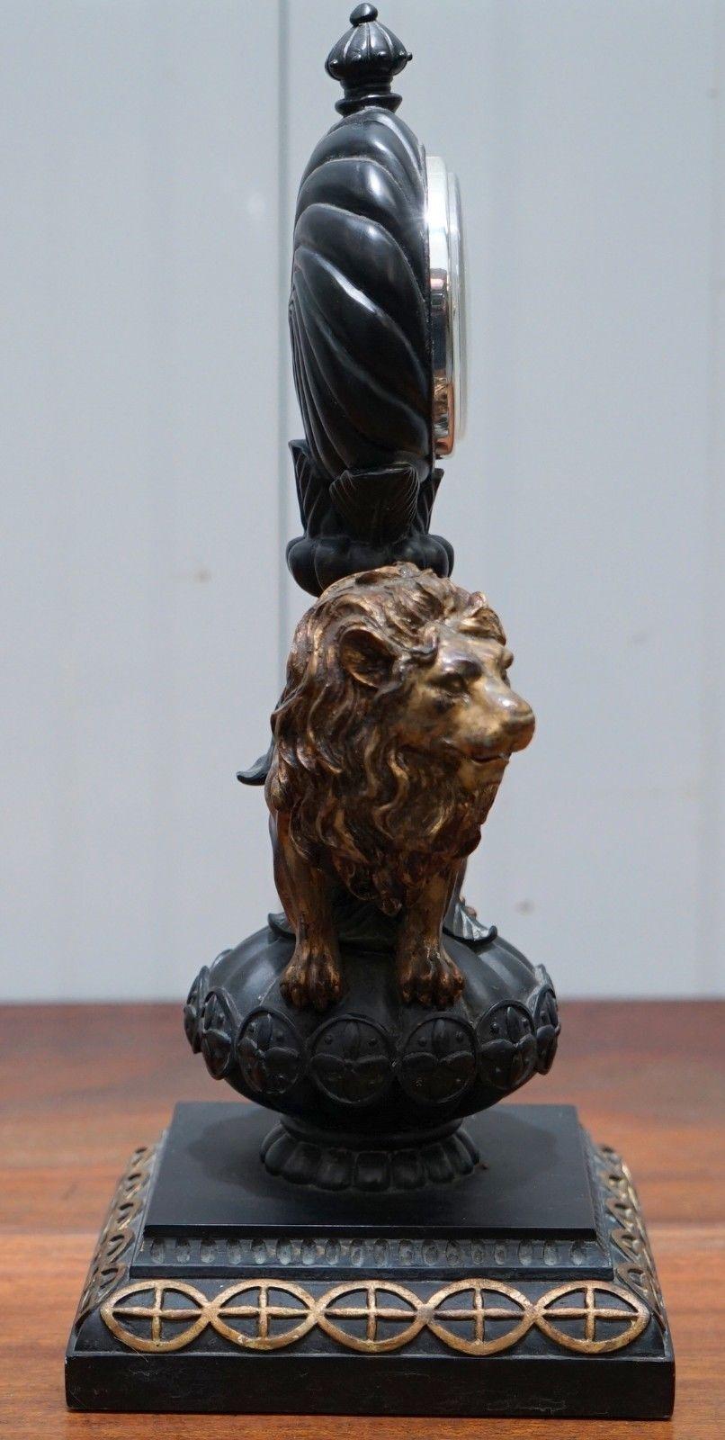 20th Century Vintage Regal Lion Standing Mantle Clock with Modern Clock Movement