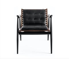 Fauteuil Atra, en noyer et acajou avec coussins en cuir par Atra