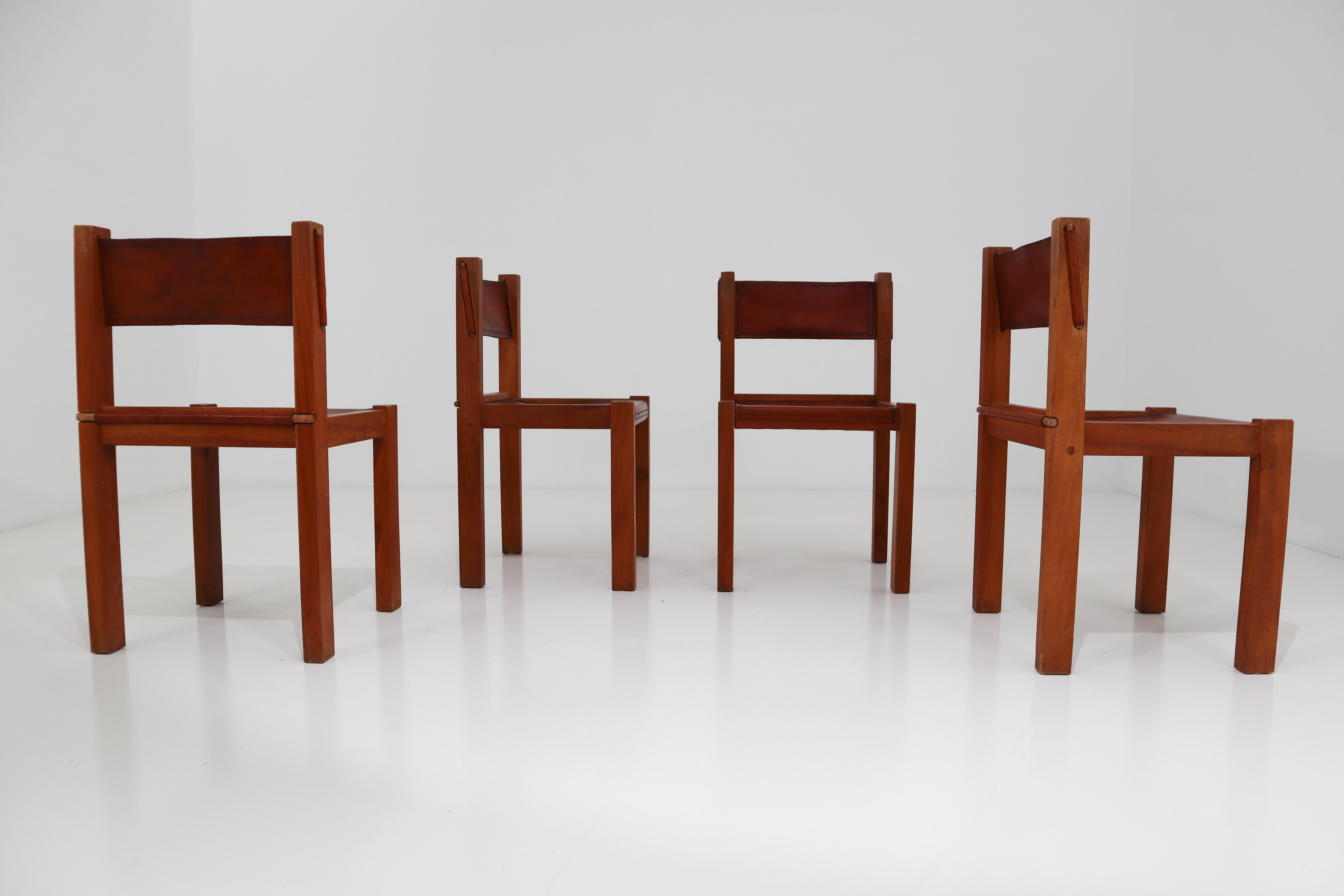 Four Midcentury Wood and Leather Dining Chairs 1