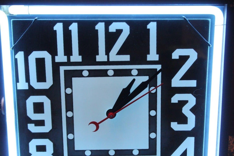 1950s Action Ad Electric Neon Rotating Advertising Clock For Sale at