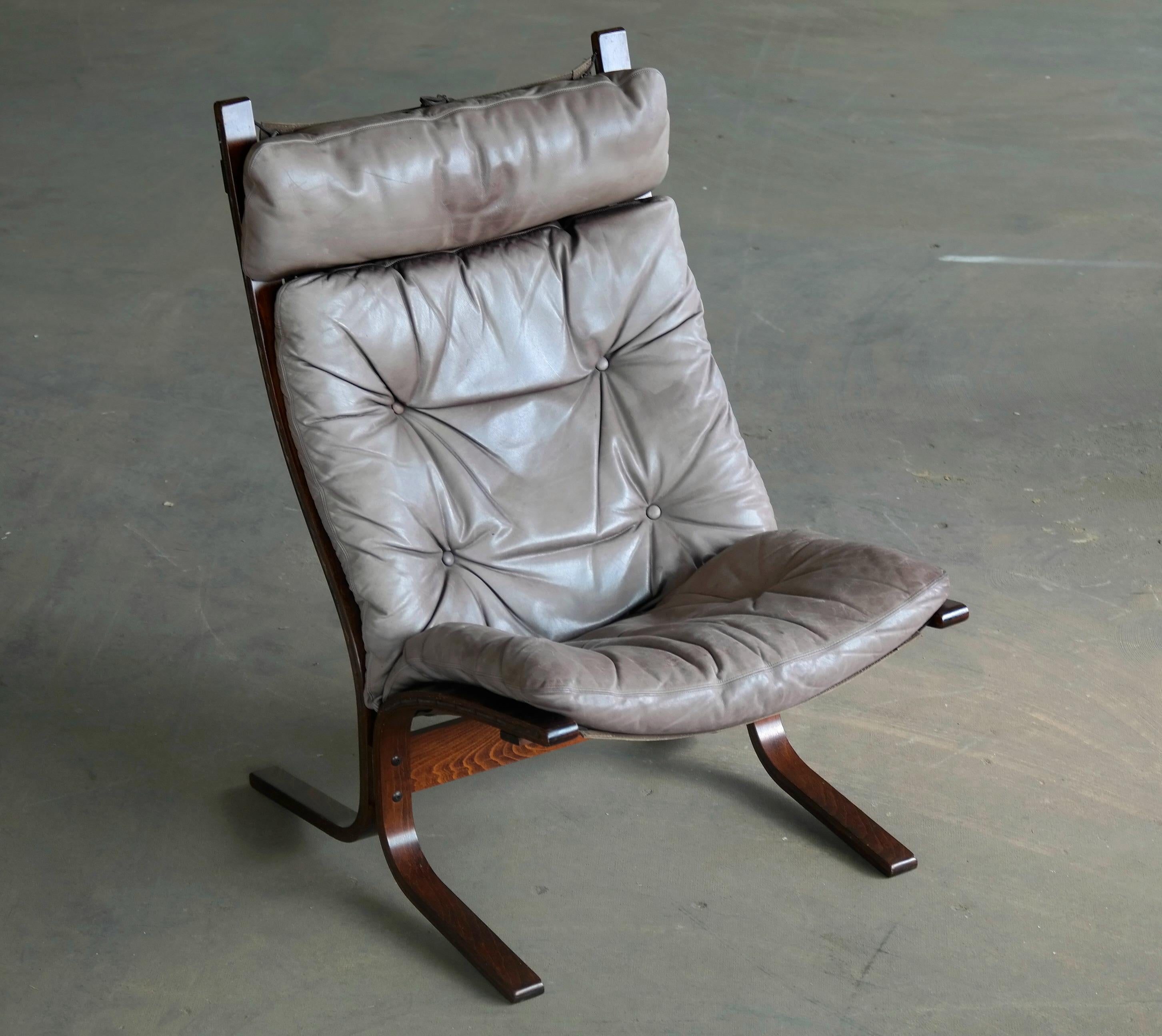 Pair of Leather Easy Chairs Model 